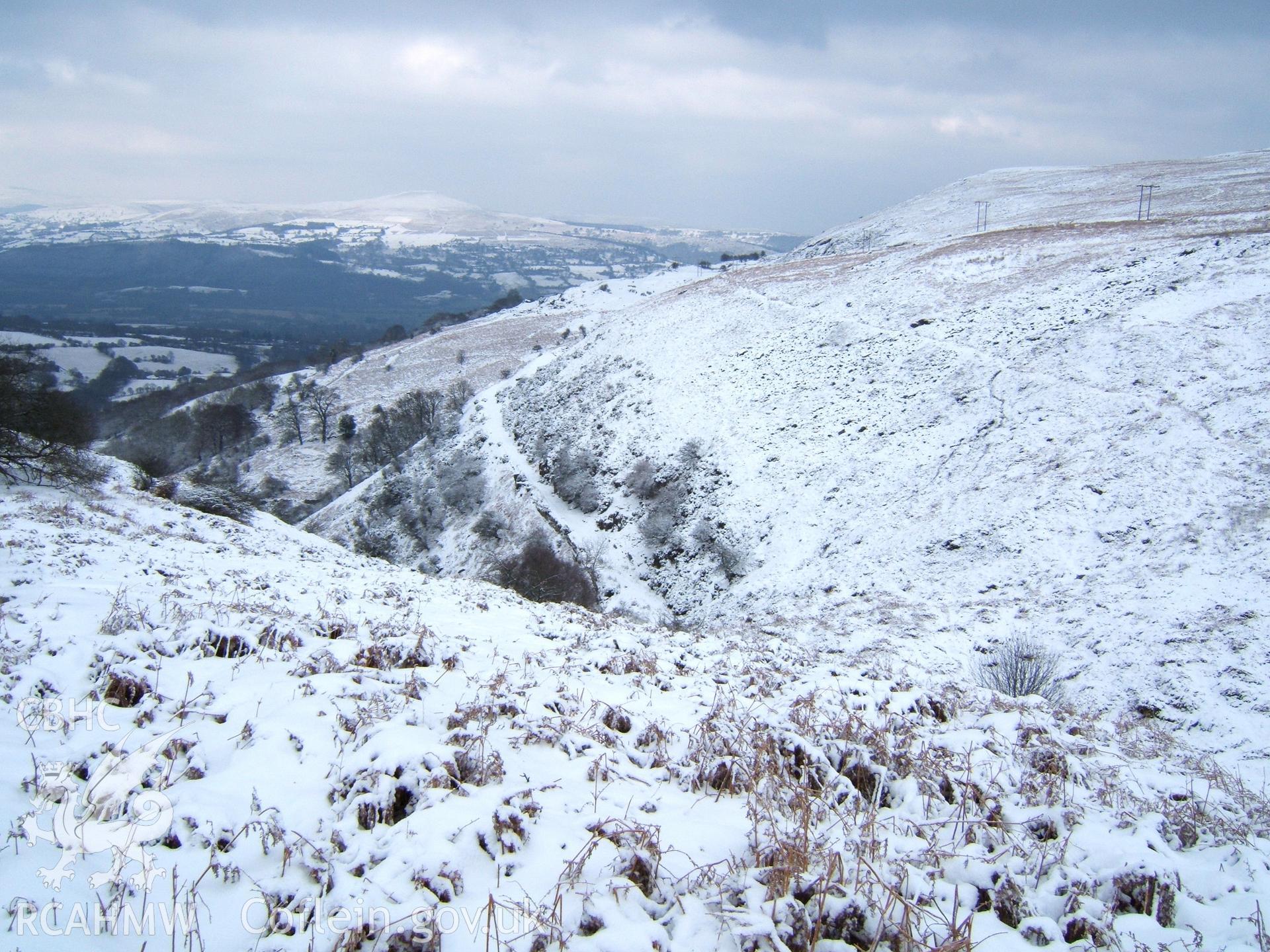 Tramroad & leat (right) from Cwm Llanwenarth bend N to Garnddyrys Forge in the snow.