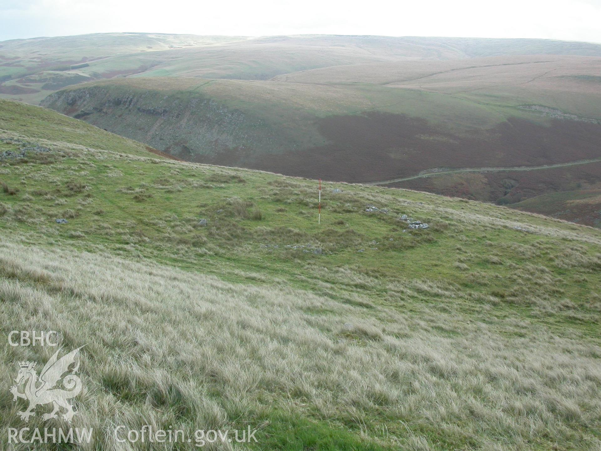 Hut circle III  (NPRN 403388) viewed from higher ground on north-west