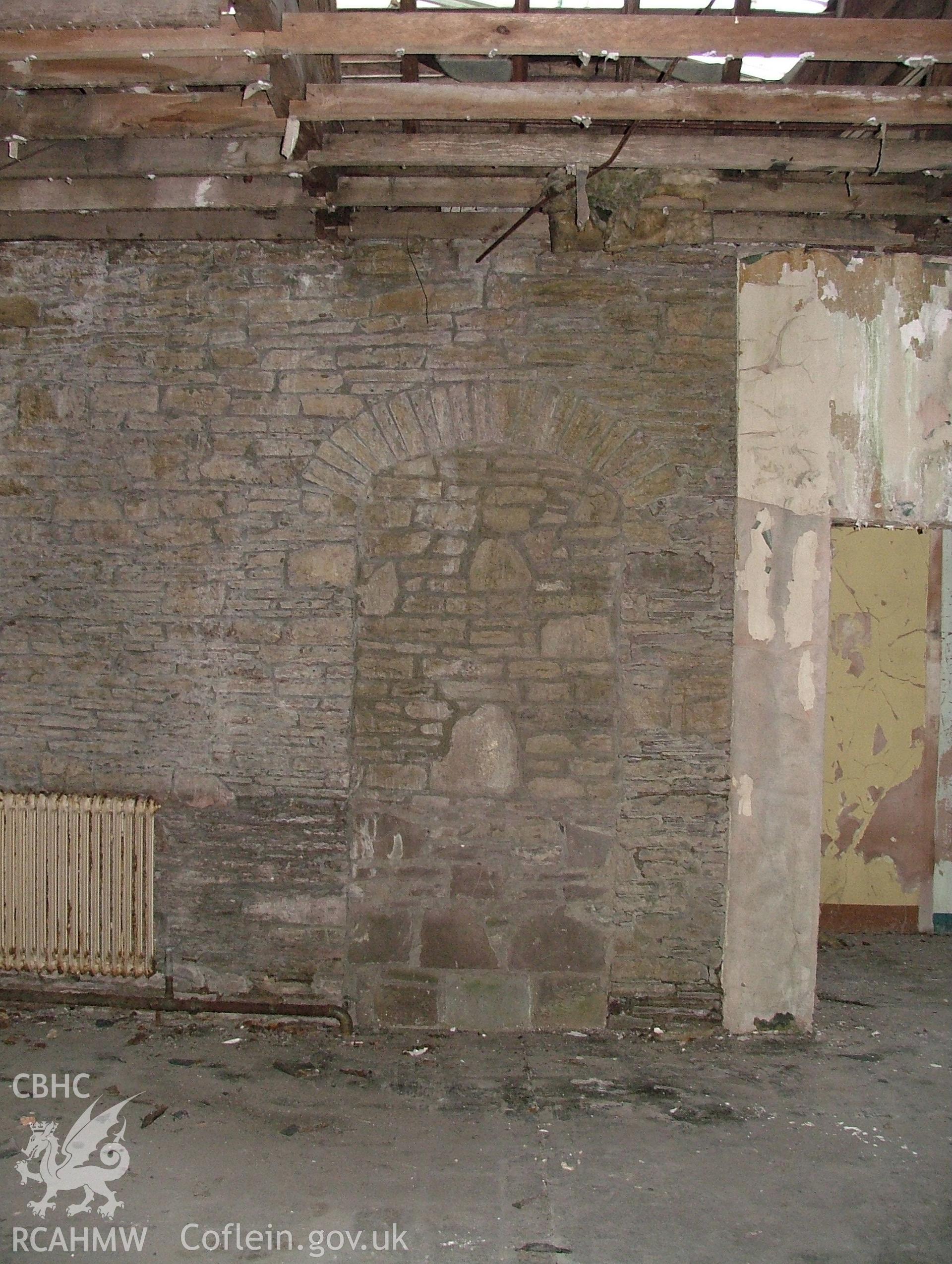 Blocked doorway in the wetern wall of the large first floor room to the north-west of the first floor hall at Malpas Court, looking north-west.