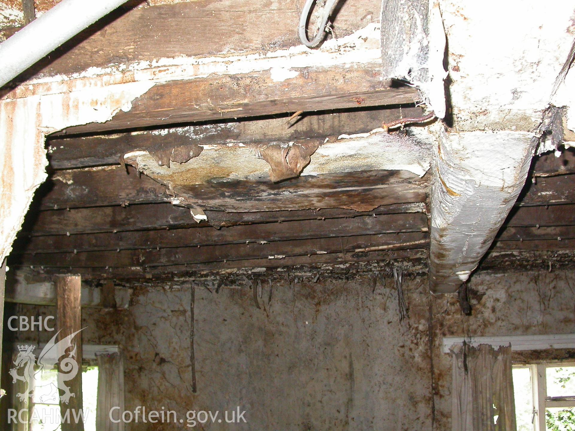 First-floor over hall, showing windows in east wall and ceiling-joists.