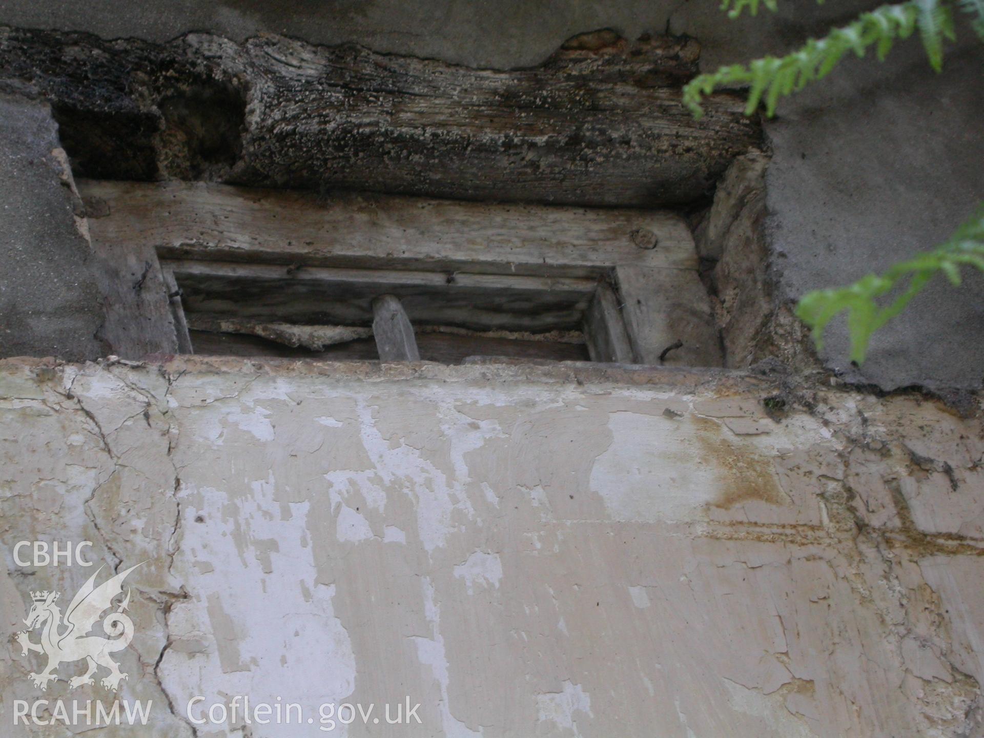 Blocked external window over former hall entrance.