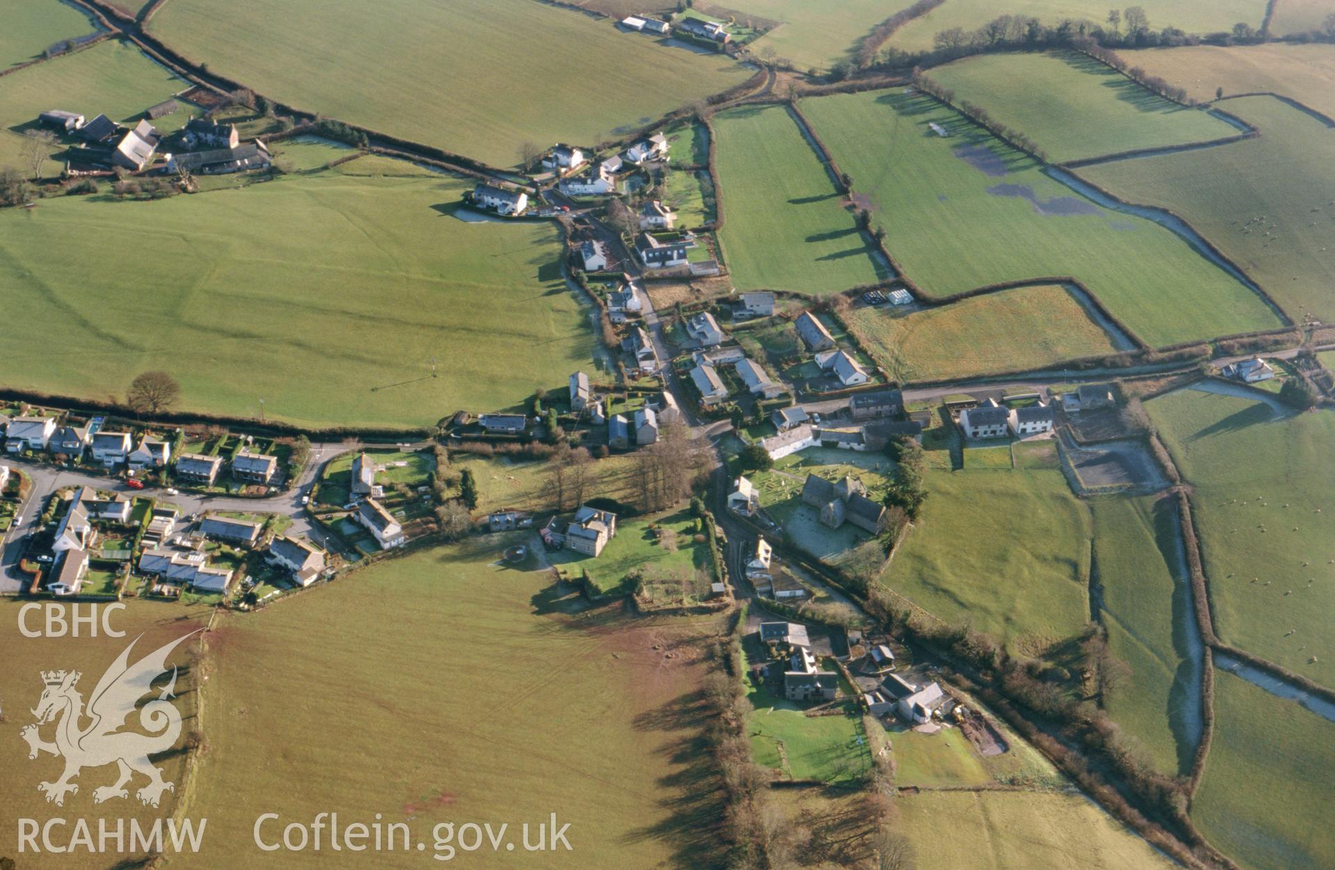 RCAHMW colour slide oblique aerial photograph of Llanddew Medieval and Later Settlement, taken on 22/01/1999 by Toby Driver