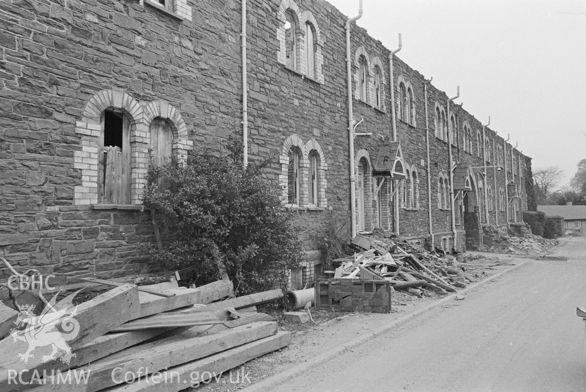 Photo showing Gogerddan Barracks, Aberystwyth, during demolition in 1980.