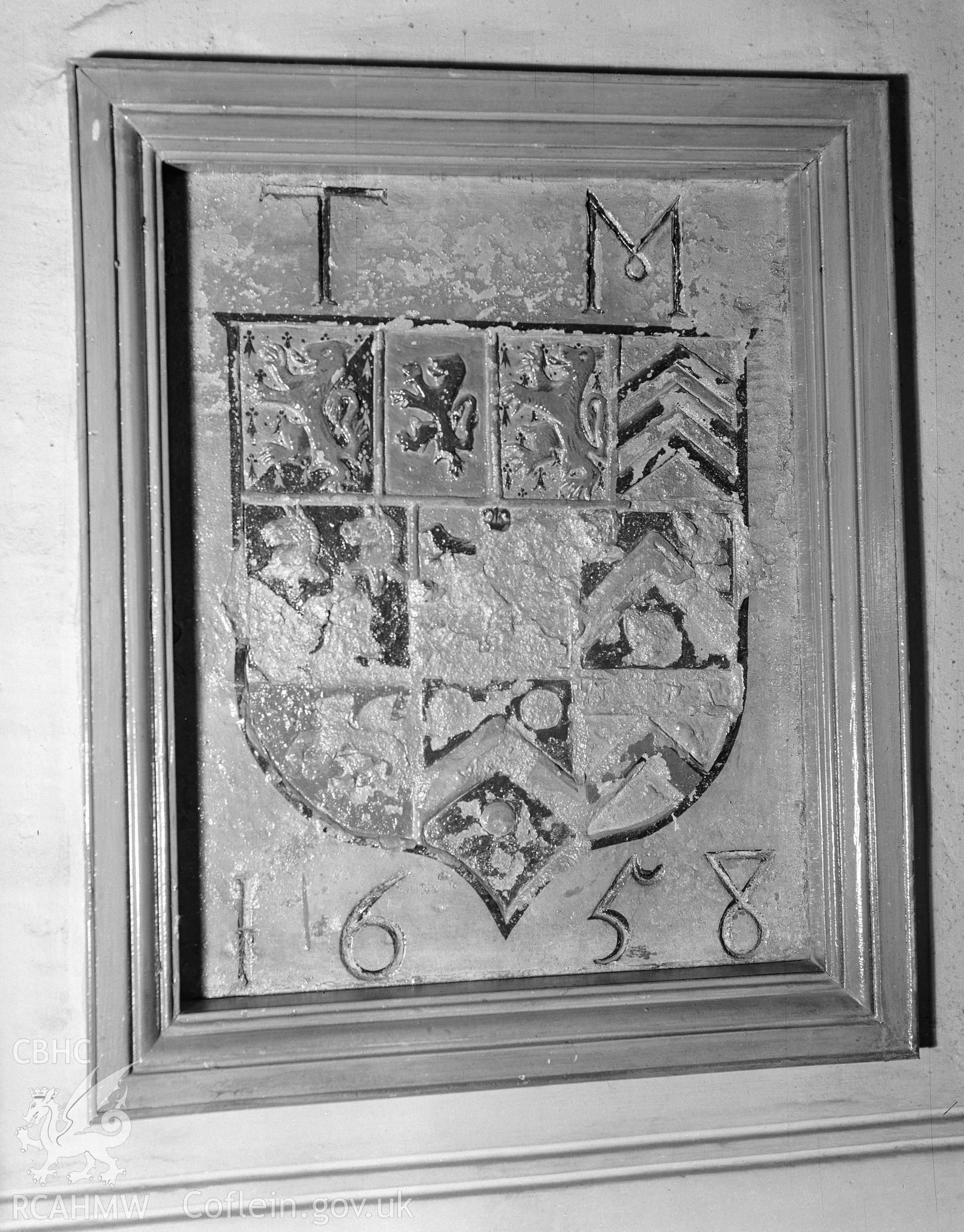 Interior view of Holywell Church showing heraldic shield, taken 13.05.1942.