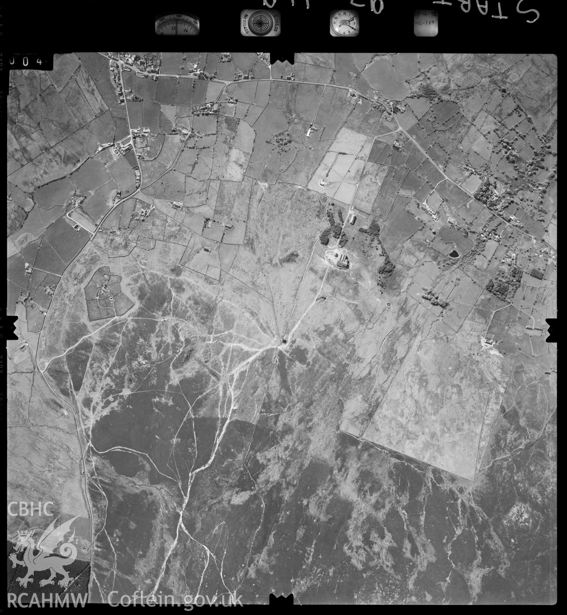 Digitized copy of an aerial view of area south east of Ceunant, Caernarfon SH5361, taken by Ordnance Survey, 1992.