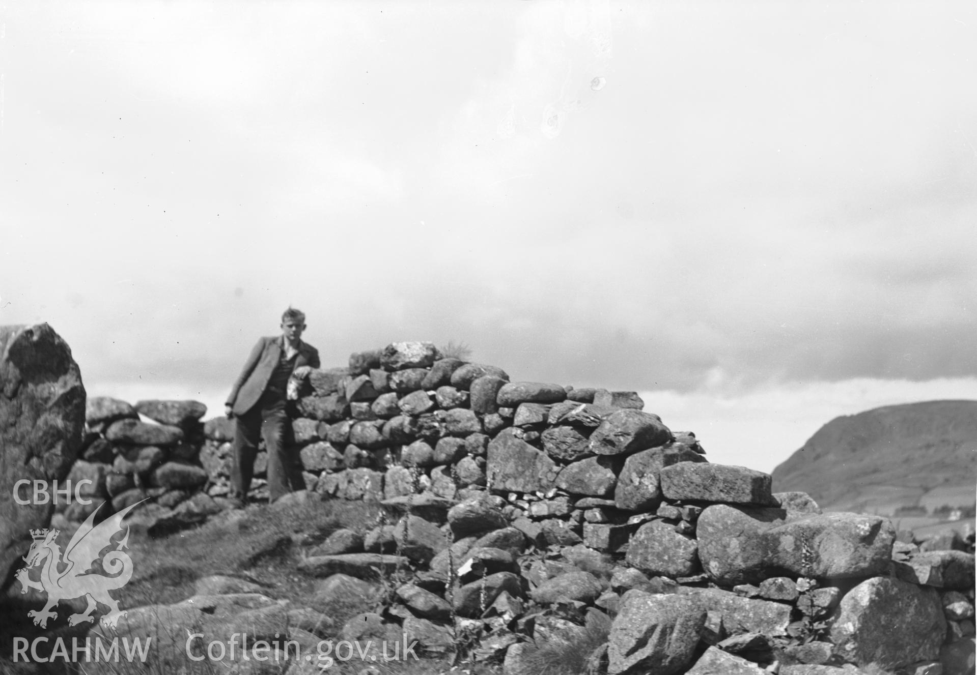 View of remains of walls of Garreg Fawr Longhouse.