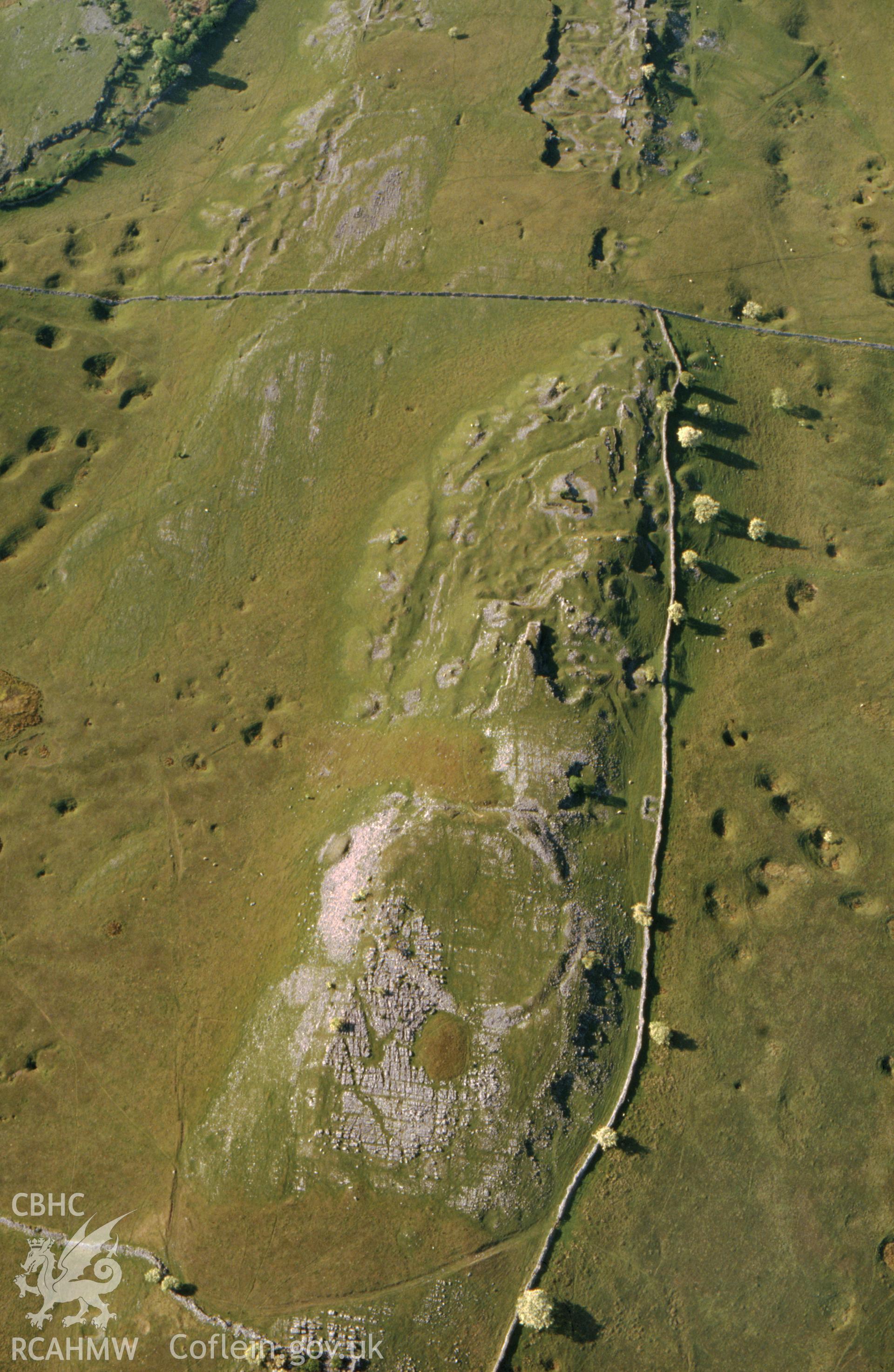 Slide of RCAHMW colour oblique aerial photograph of Carnau Gwynion (sw), Lime Workings, taken by C.R. Musson, 24/5/1990.