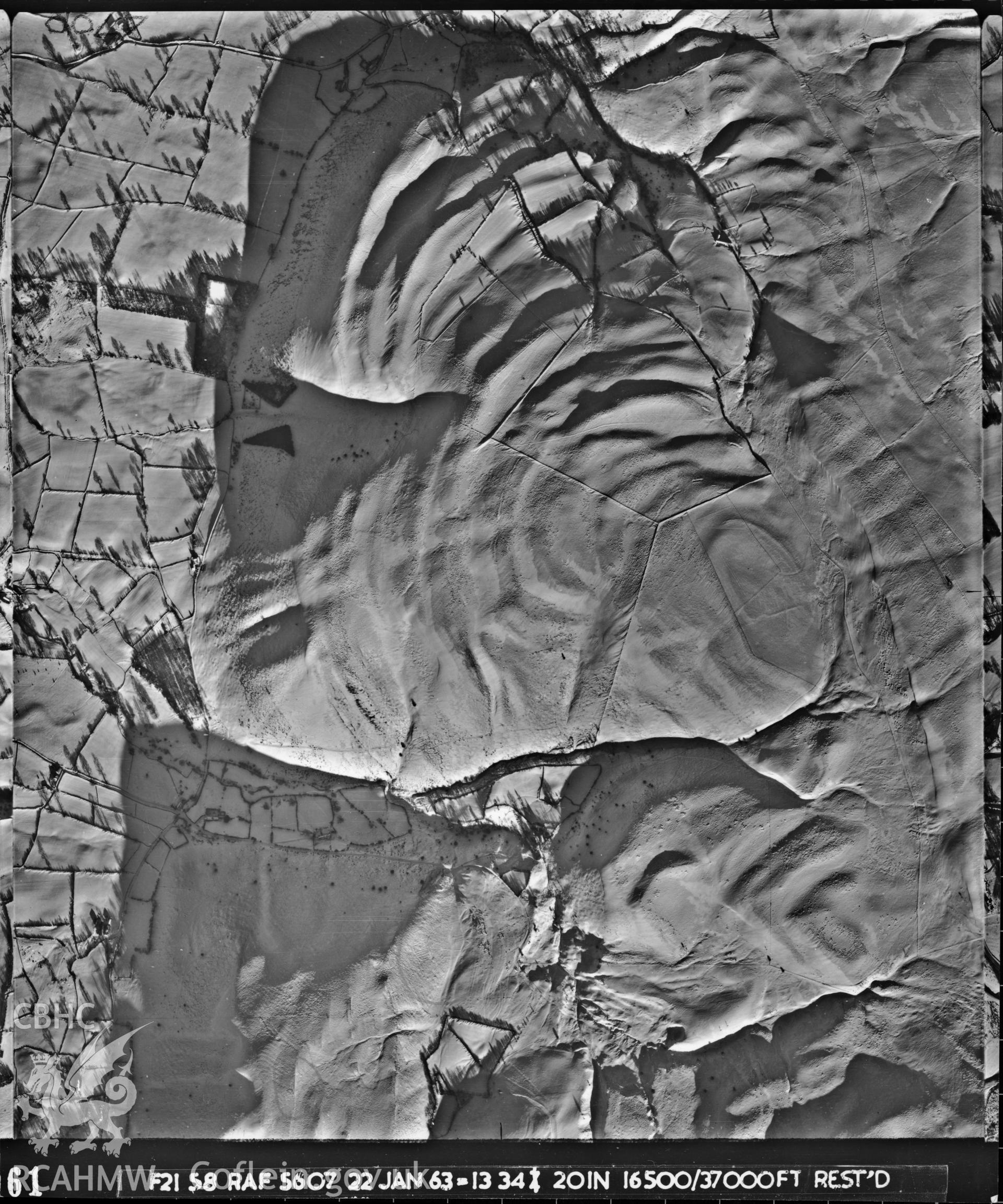 Black and white vertical aerial photograph taken by the RAF in 1963, centred on the area around Llanidloes..