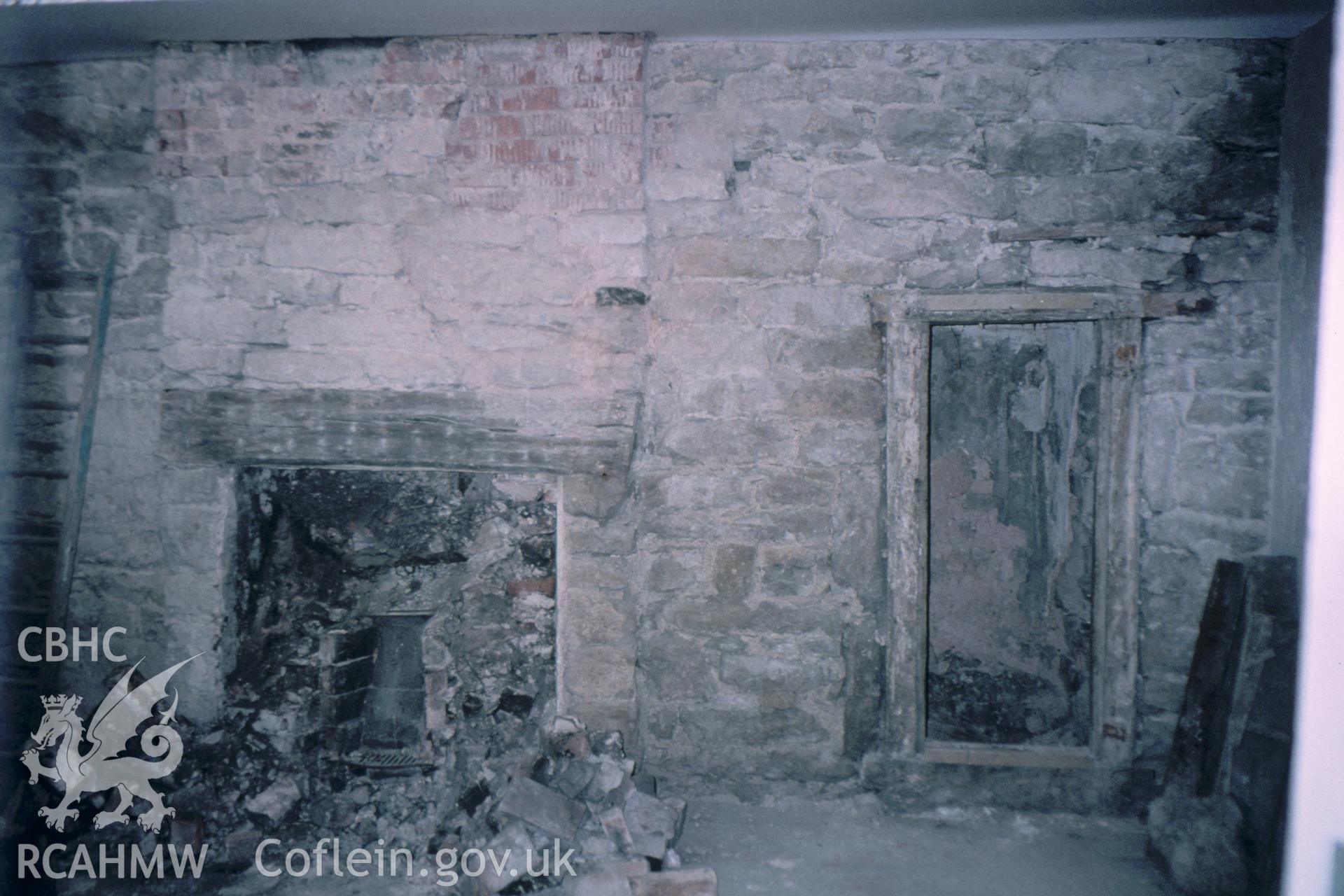 Interior view, showing fireplace and latrine in Great Chamber.