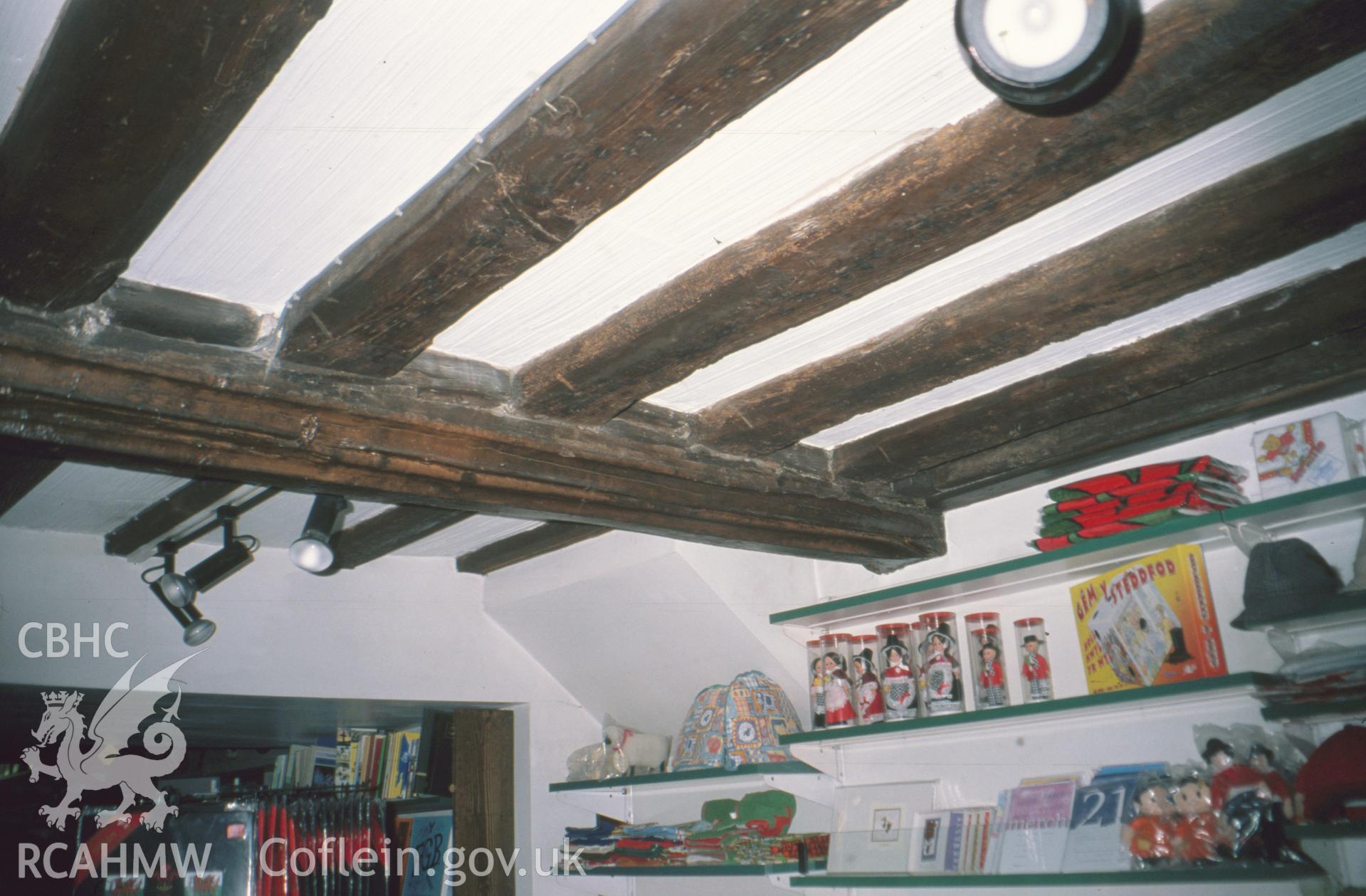 Interior view showing moulded ceiling beam amd joists at Back Row end.