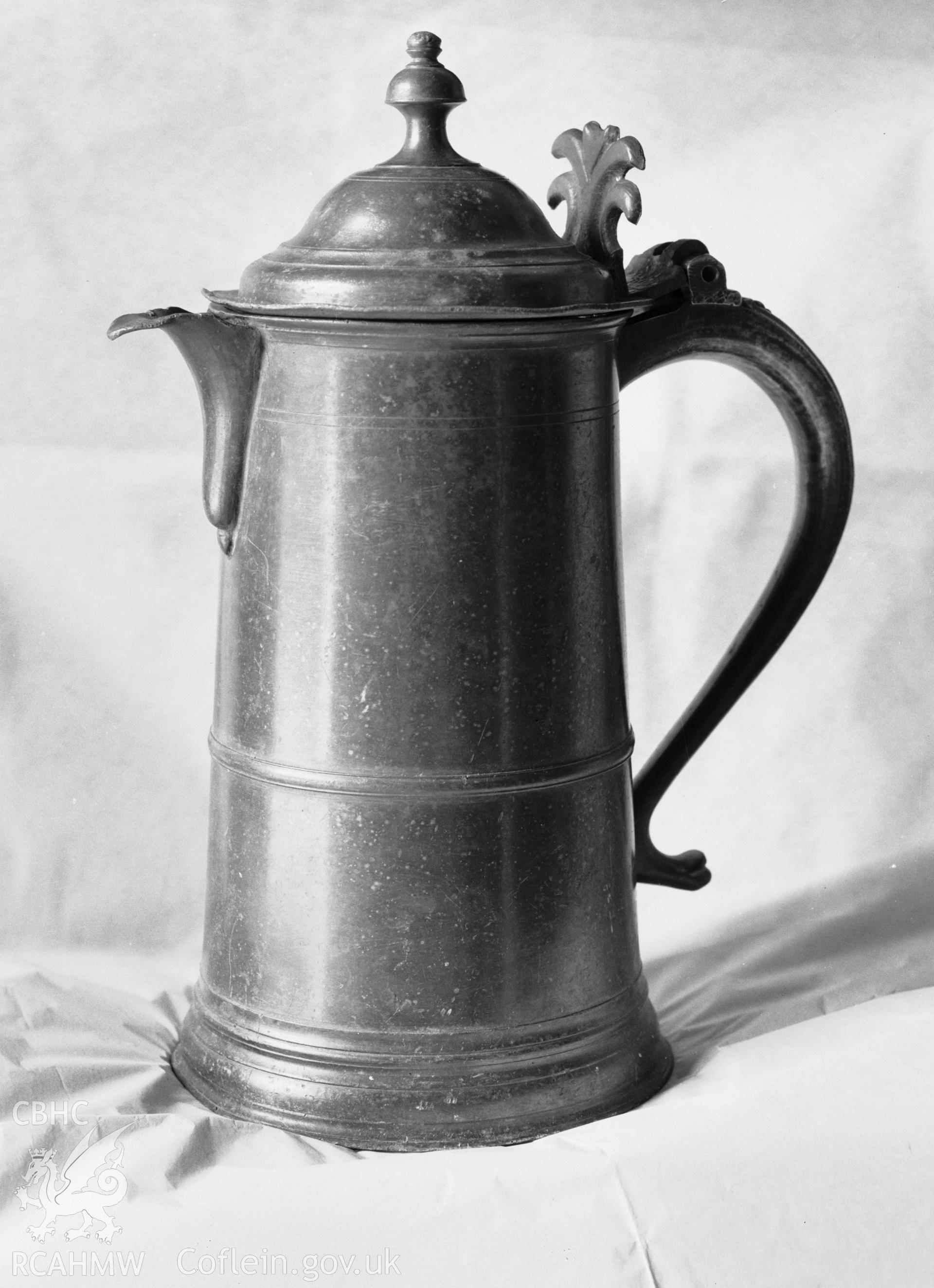 Detail view of flagon from St Twrog's Church, Llandwrog,  taken 28.04.1938.