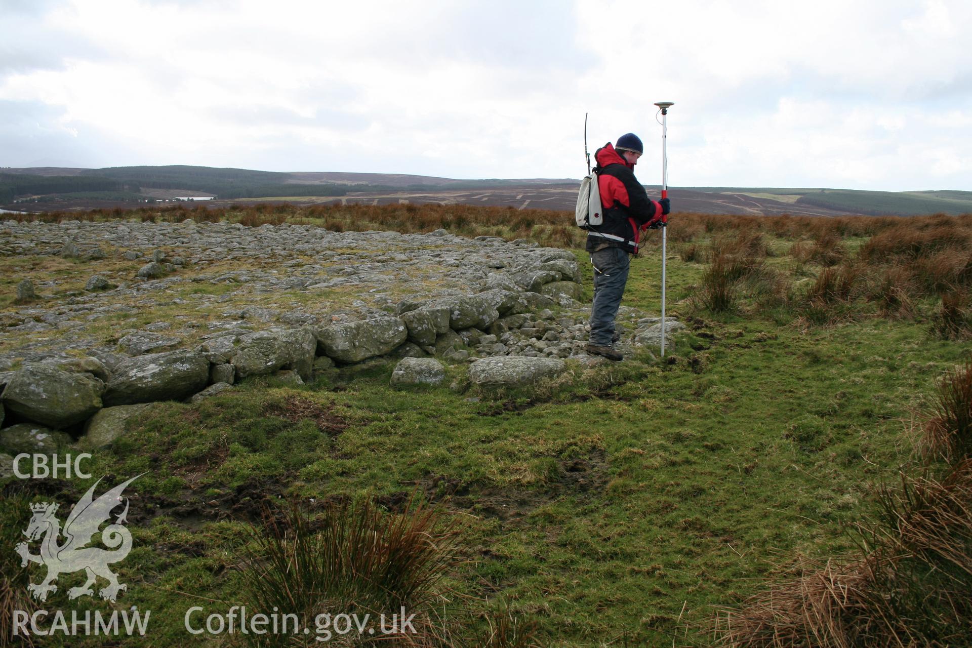 Small semi-circular cairn abutting the main cairn, taken from the southeast.