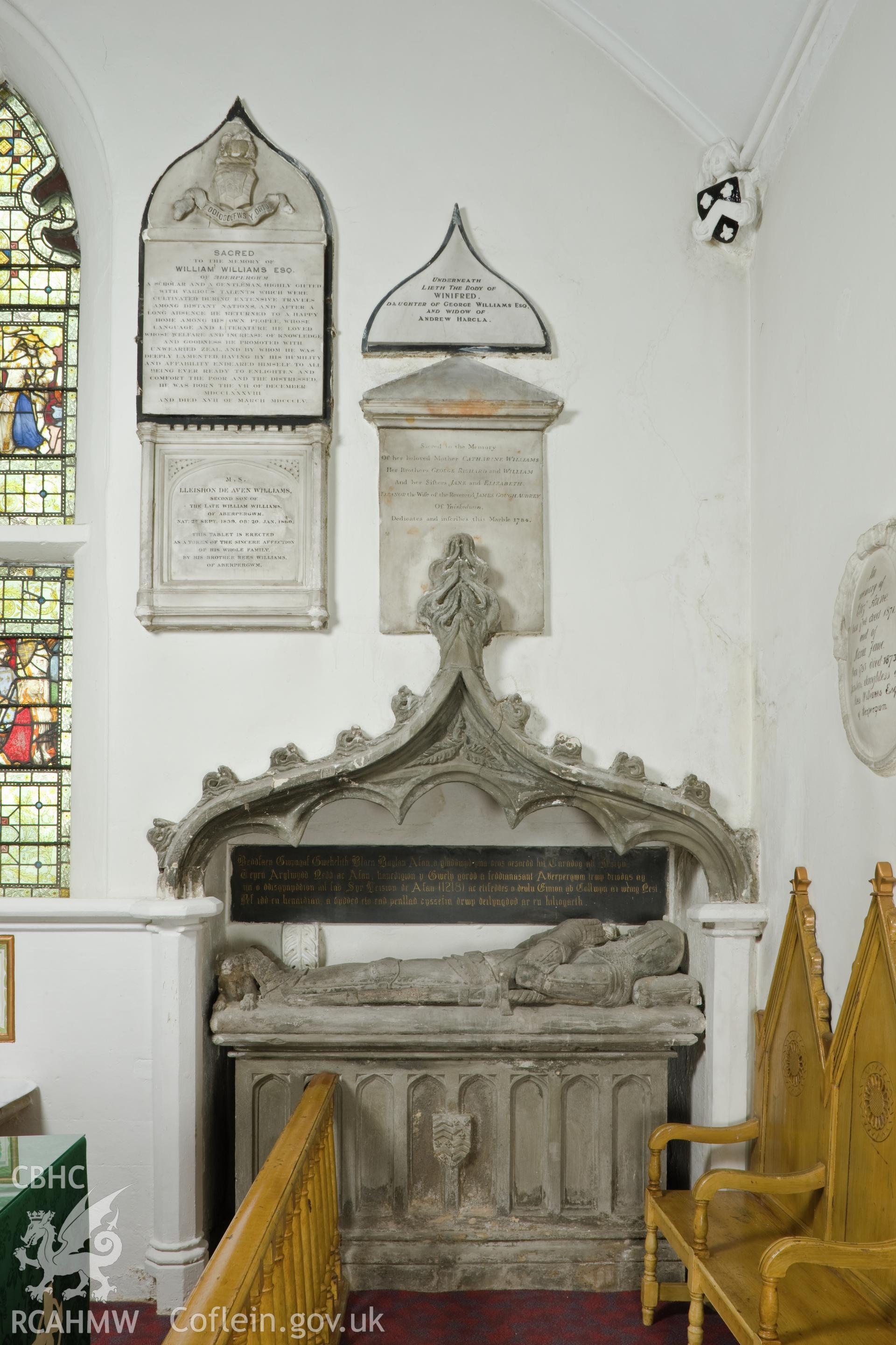 Tomb on right of altar.