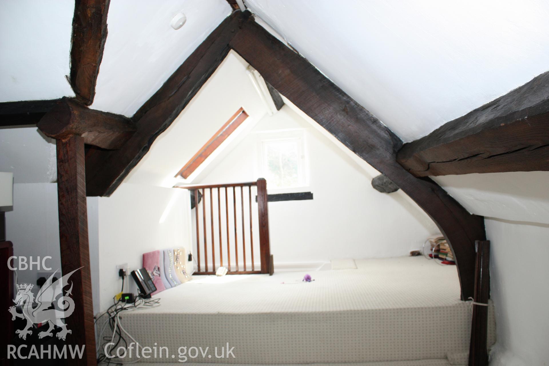 17th century cross-wing below 53, Clwyd Street, showing roof-truss.