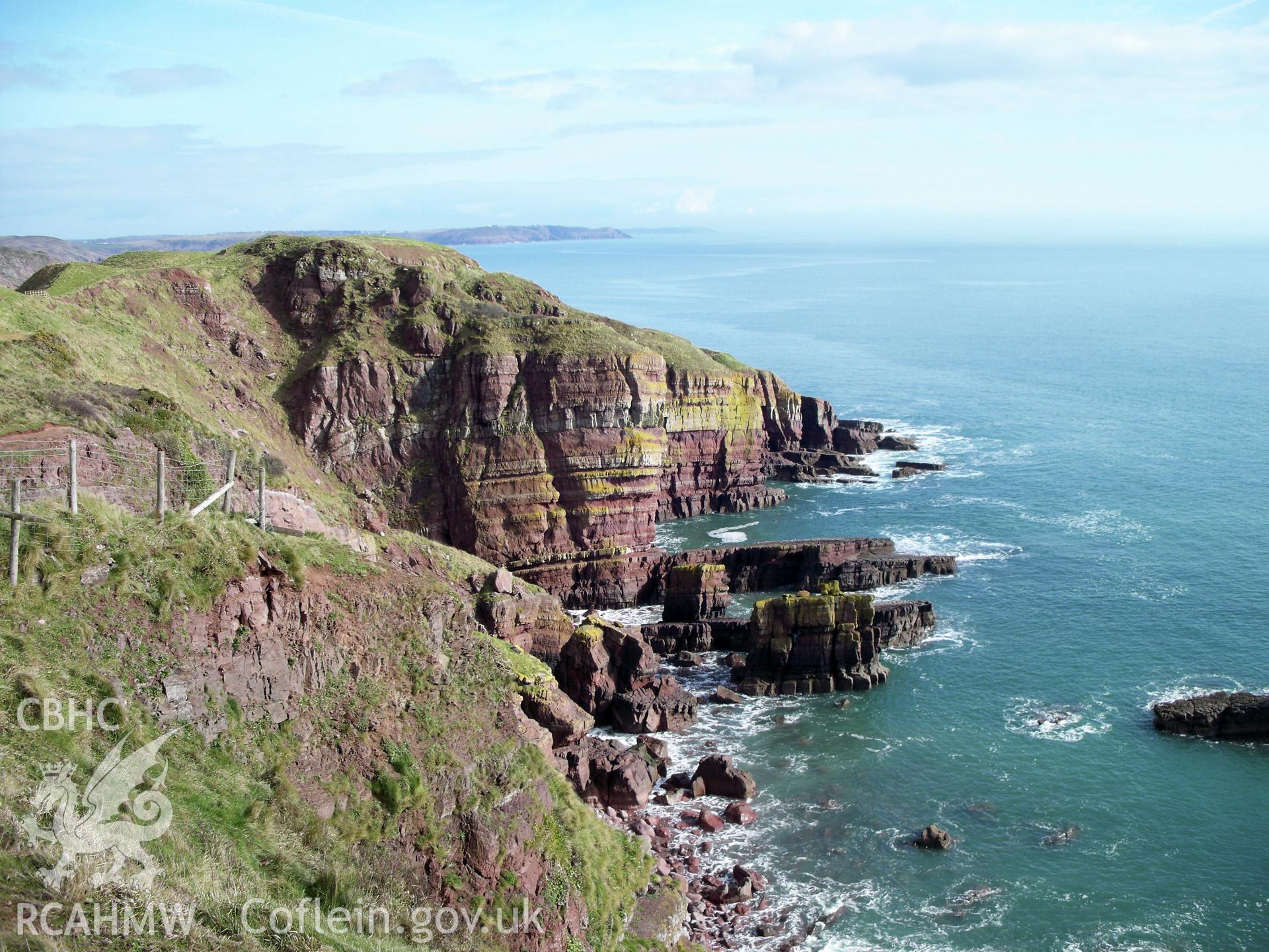 General view looking east along the red sandstone cliffs of Greenala Point Fort.