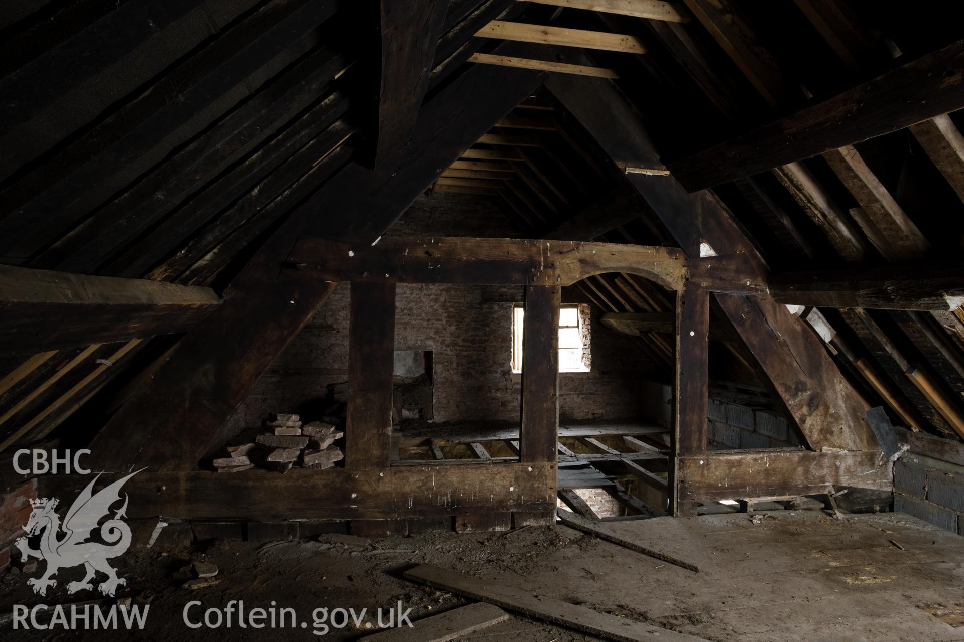 Second floor, third bay roof truss looking towards fourth bay.