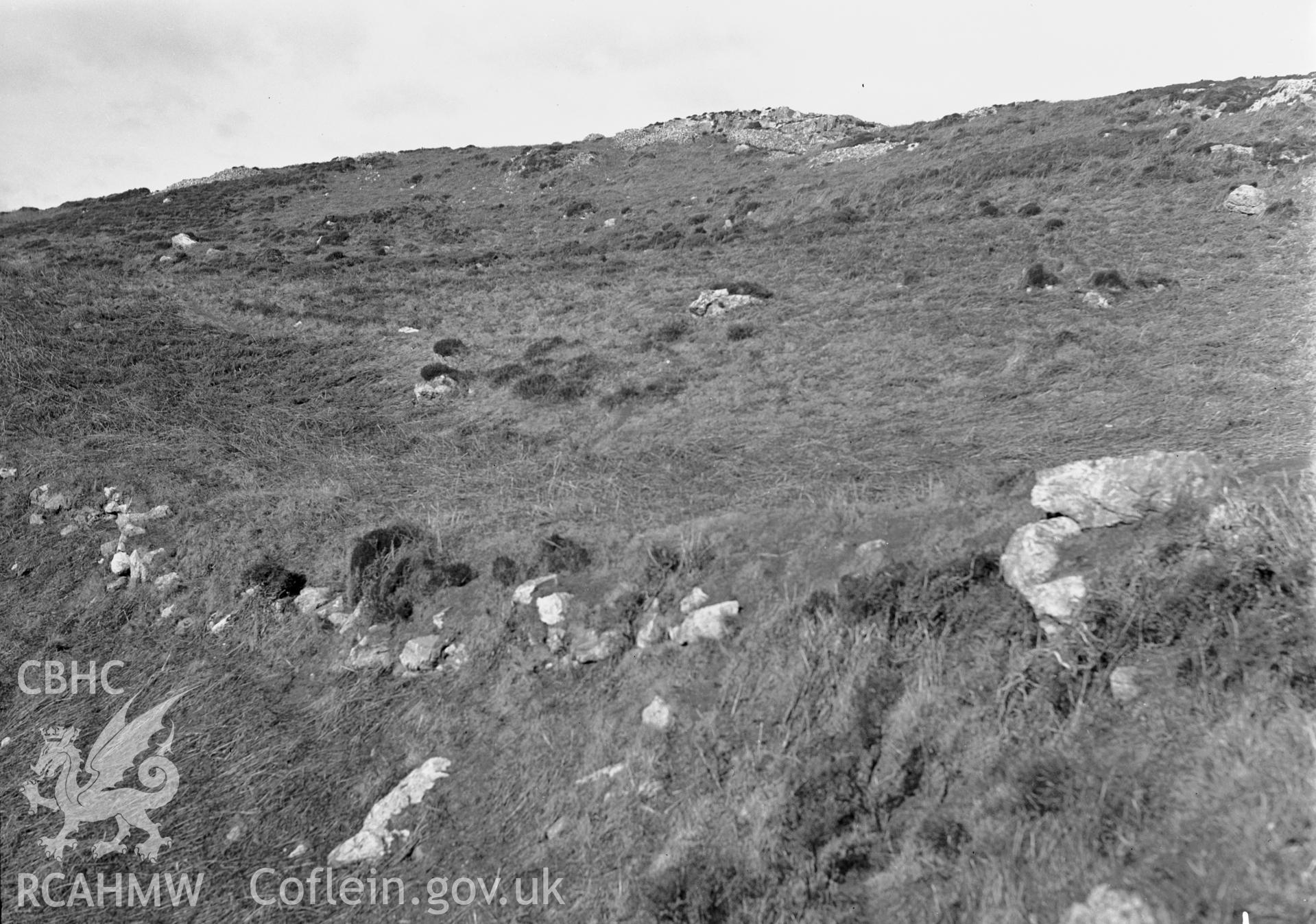 Main wall of Dinas Gynfor looking north-west towards the entrance, taken by RCAHMW c1930.