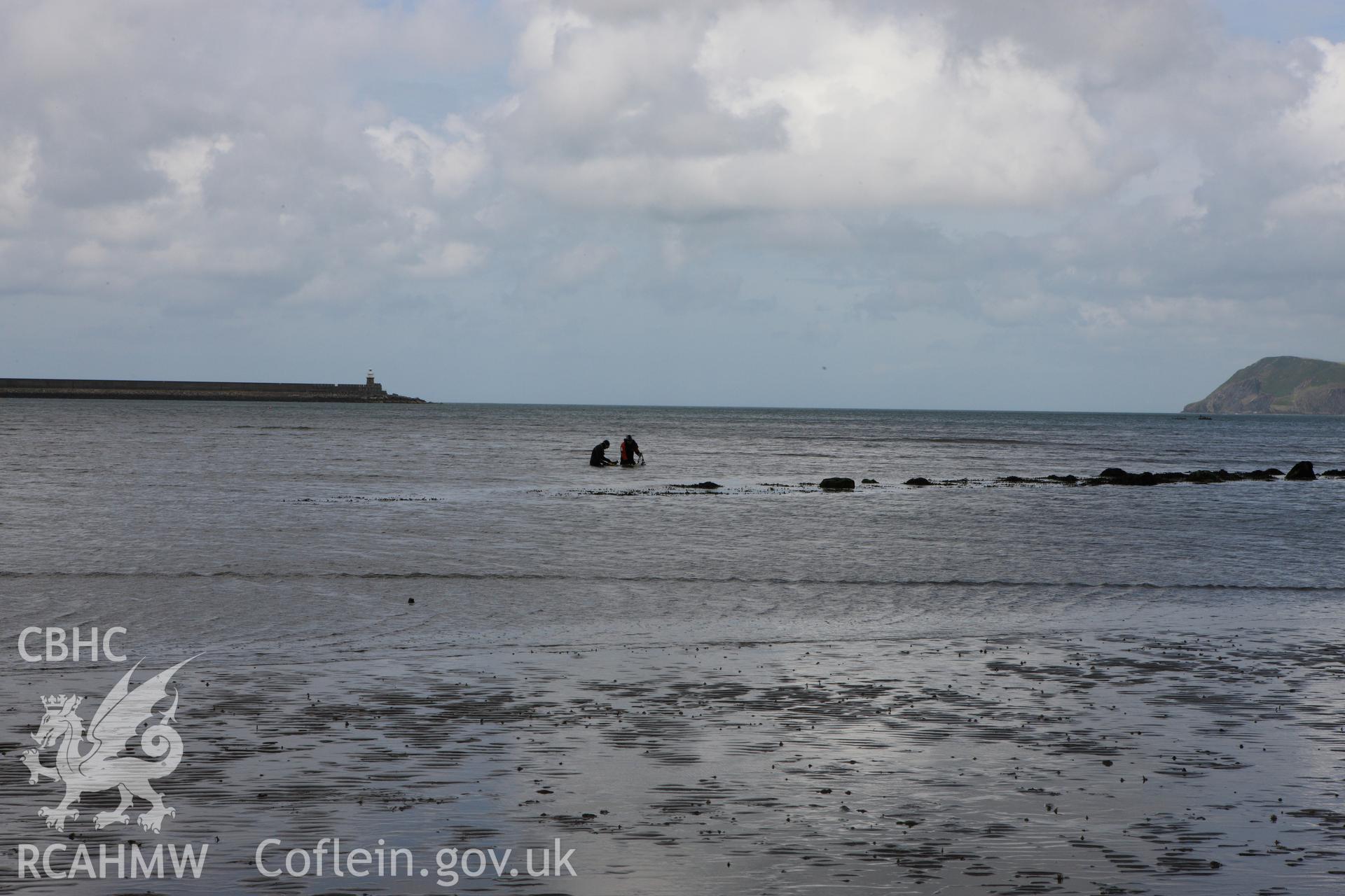 Fishguard harbour south-east fish trap at low tide.