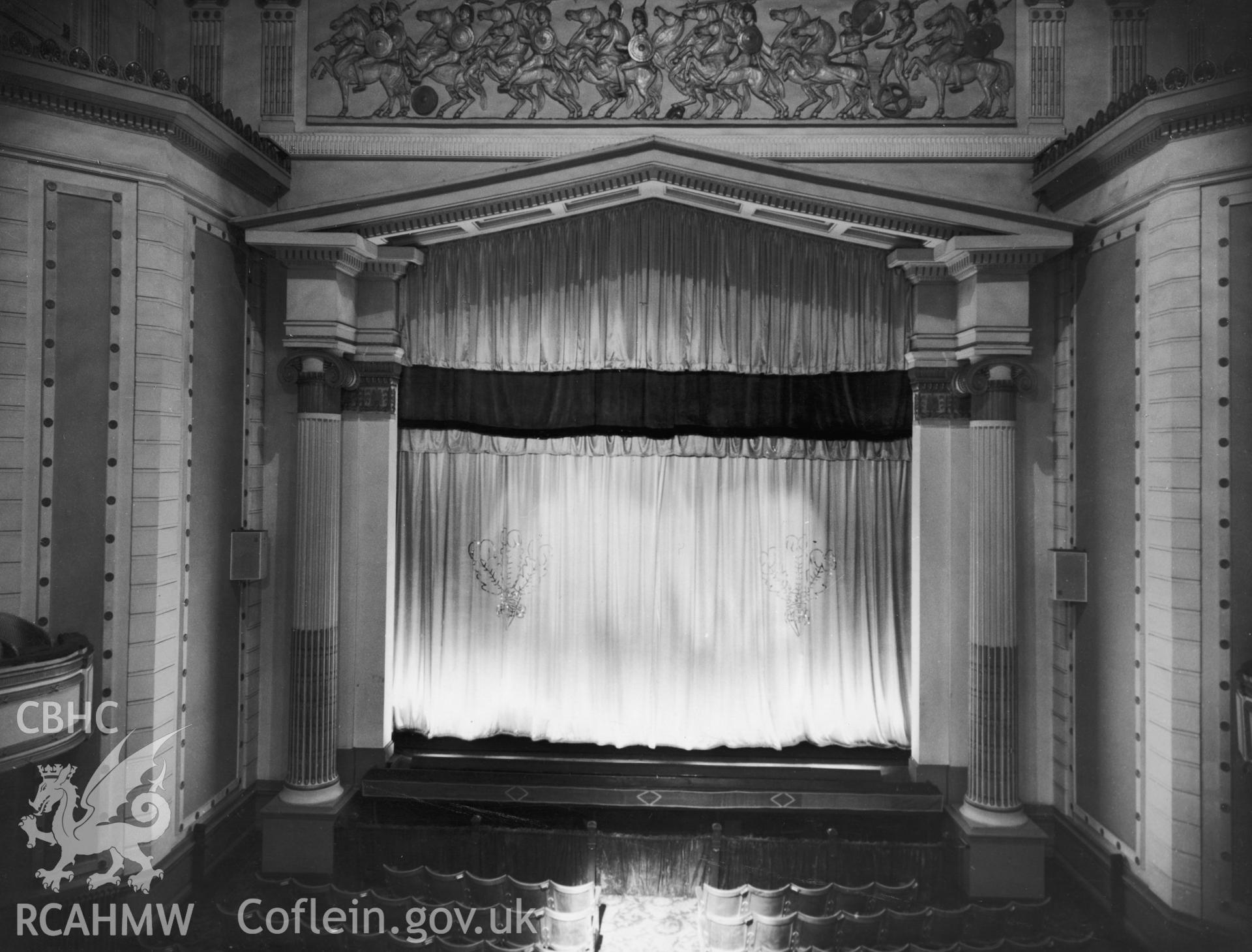 One black and white print of the Prince of Wales Theatre, Cardiff, showing the interior - stage. Undated but received by NBR on 22/03/1960.