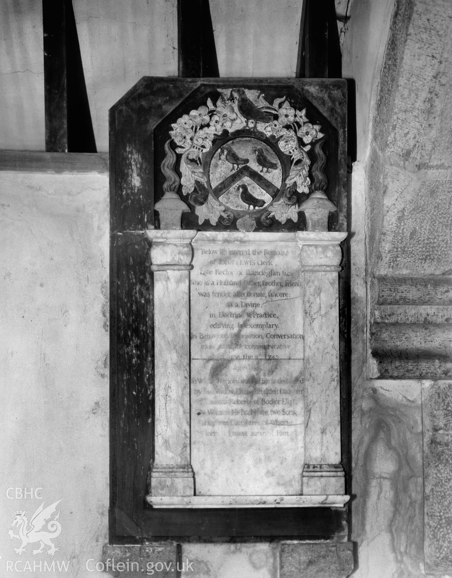 Digitised copy of a black and white negative showing fittings from St Michael's Church, produced by RCAHMW, pre1960.