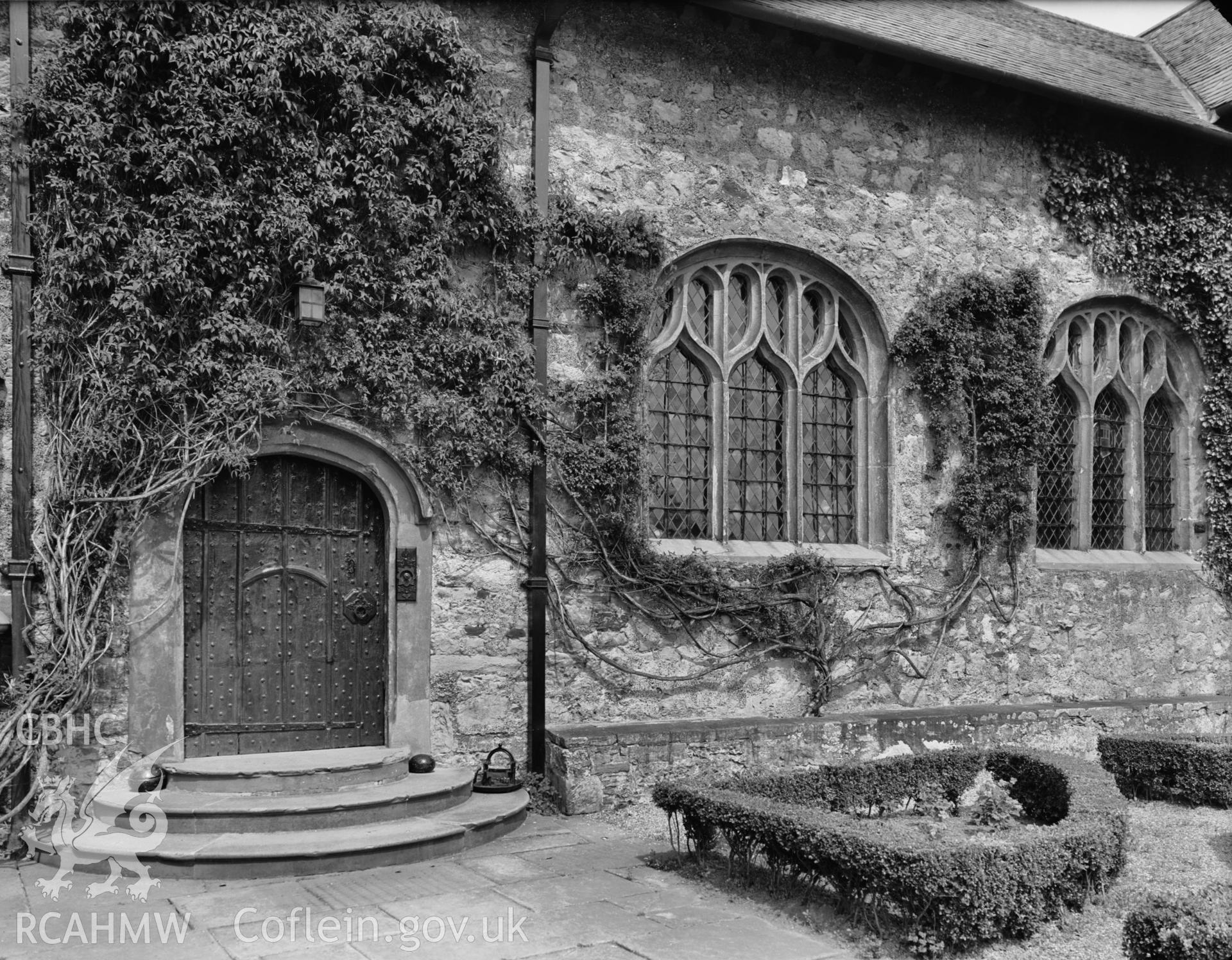 Exterior view showing the door and windows of the Great Hall.