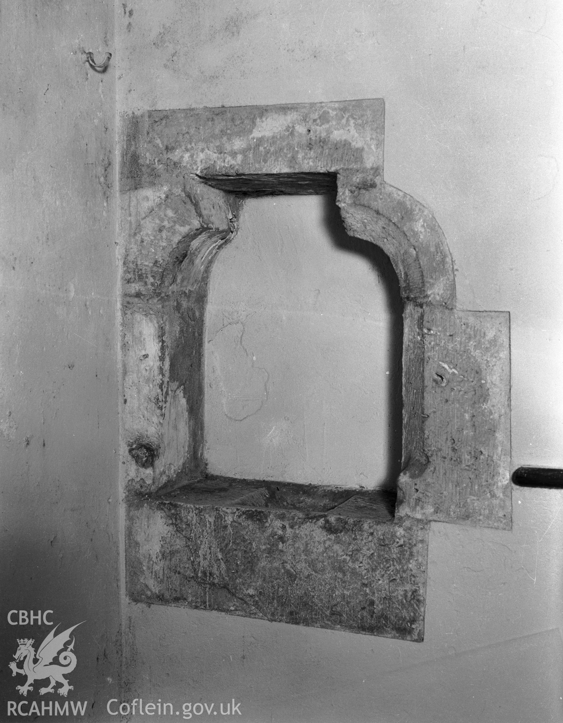 Interior view showing the piscina in the south wall of the chancel.