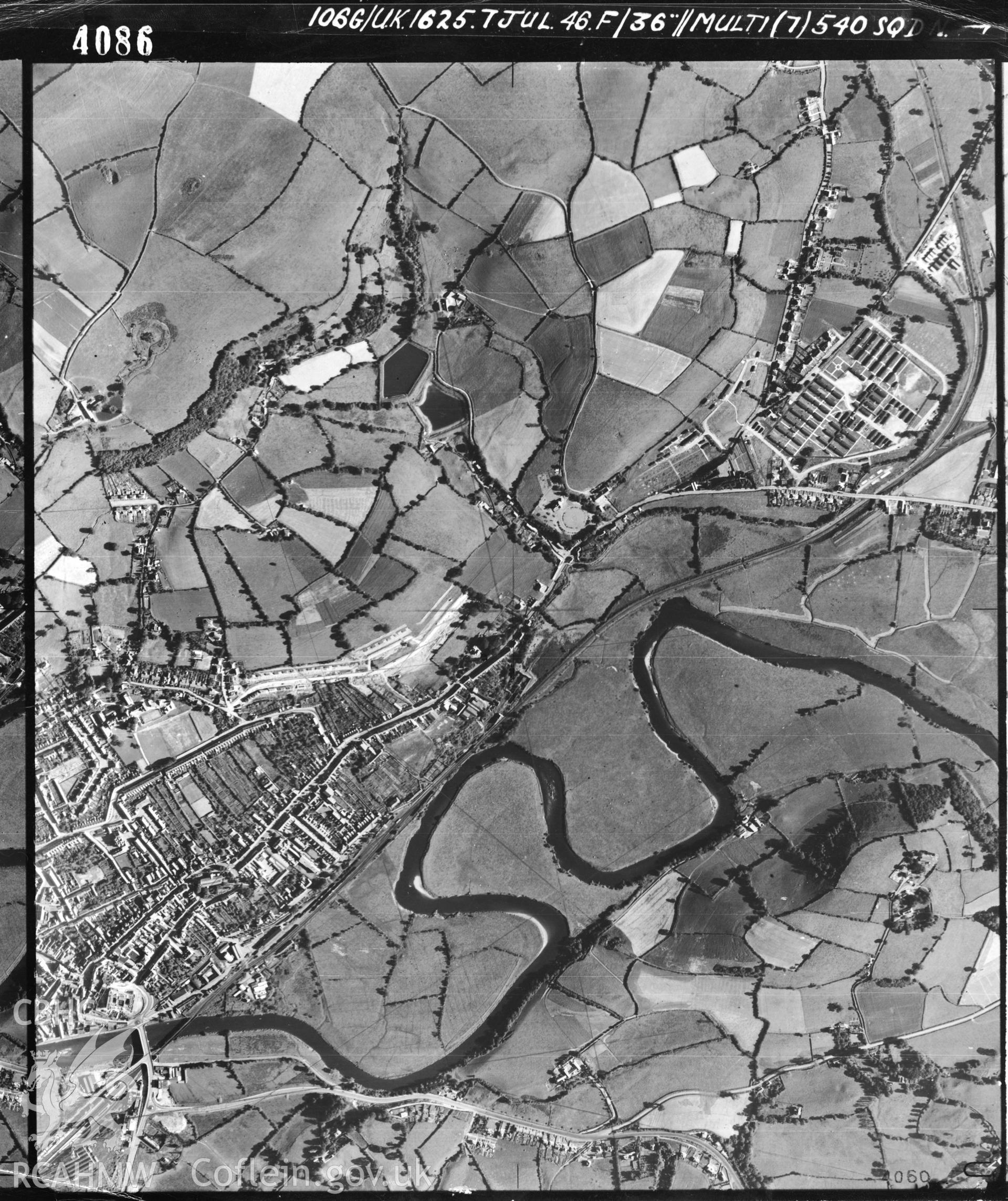 Black and white vertical aerial photograph taken by the RAF on 07/07/1946 centred on SN42122075 at a scale of 1:10000. The photograph includes part of Carmarthen community in Carmarthenshire.