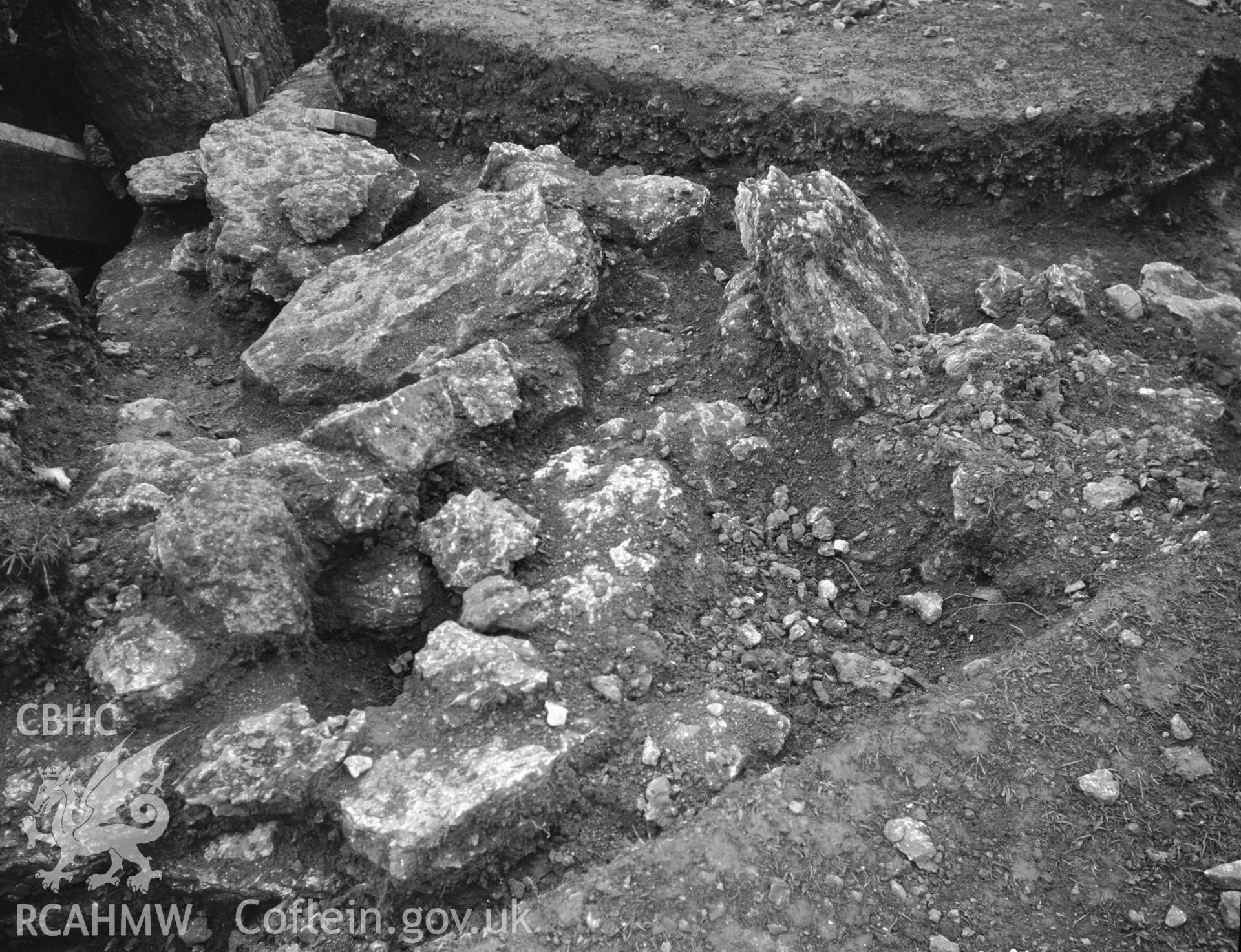 Upright stone and probable socket on the north-east side of the mound, taken during the second season of excavation, April 1932.