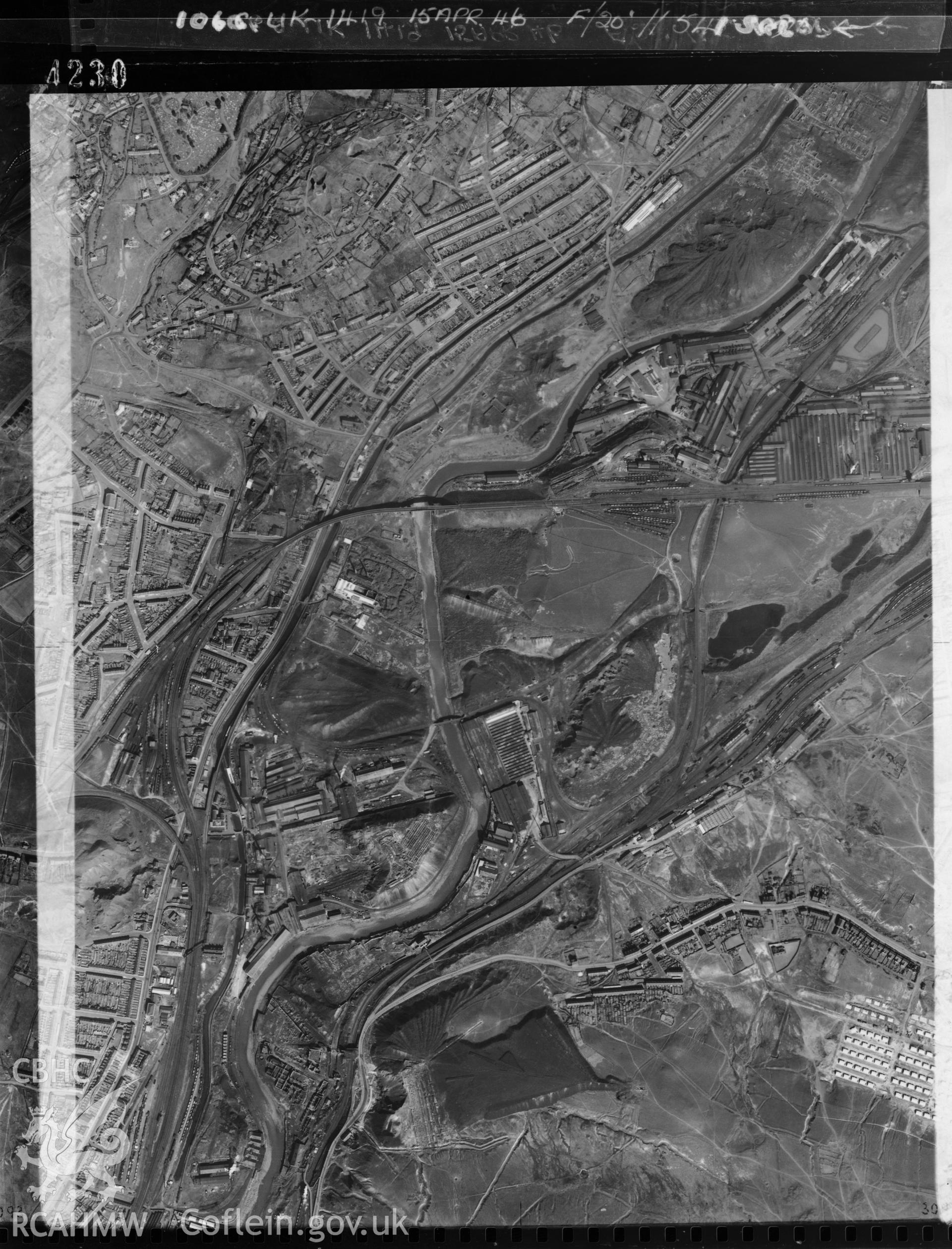 Black and white vertical aerial photograph taken by the RAF on 15/04/1946 centred on SS65949540 at a scale of 1:10000. The photograph includes part of Landore community in Swansea.