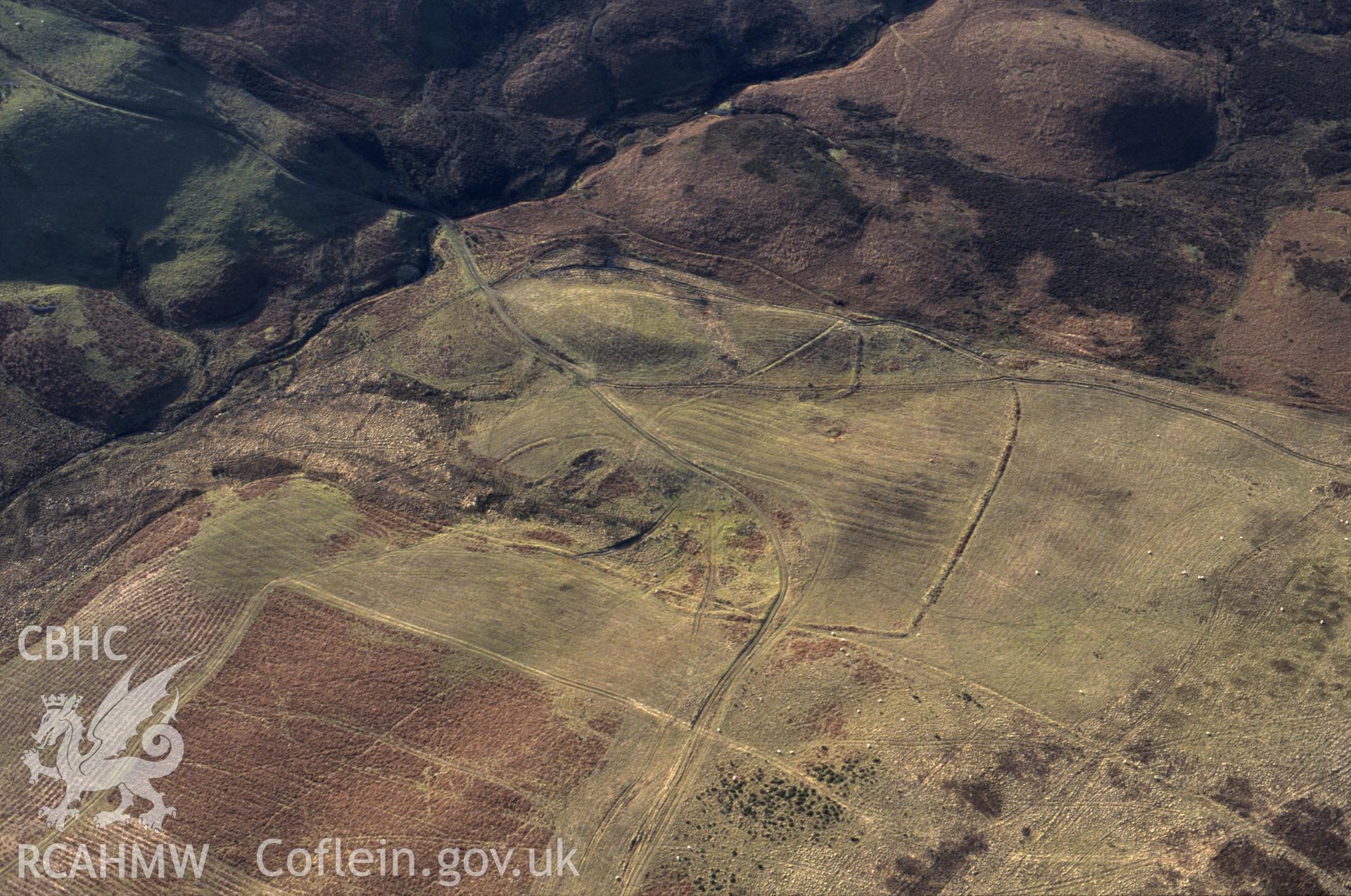 RCAHMW colour slide oblique aerial photograph of Site of Hospice, Llanwddyn, taken by C.R.Musson on the 14/02/1997