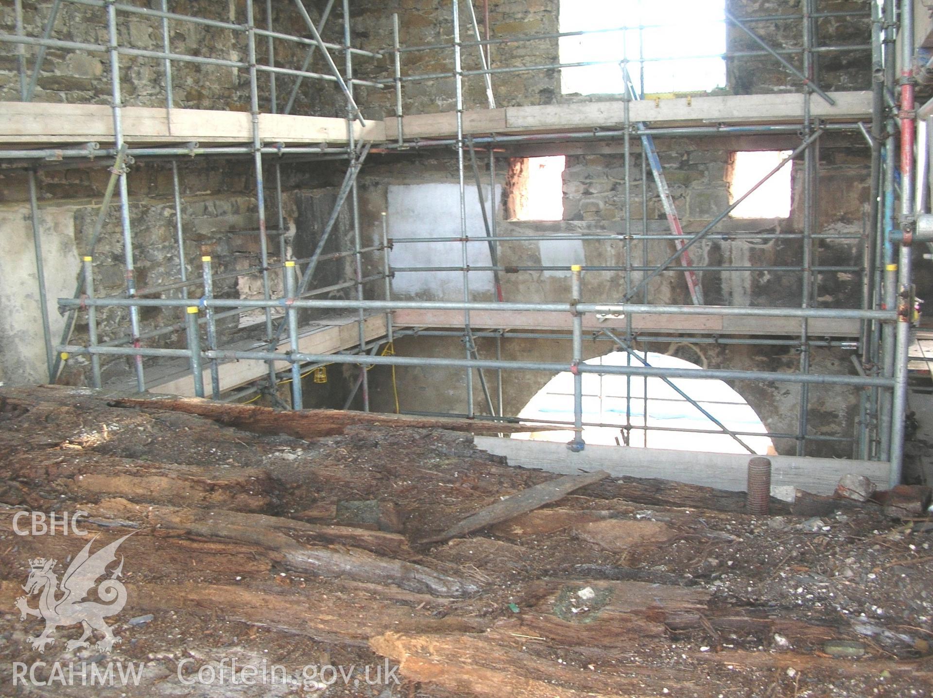 Colour photo showing interior view from the bob wall at the Clive Engine House, Talar Goch Mine, produced by C.J. Williams, 2012.