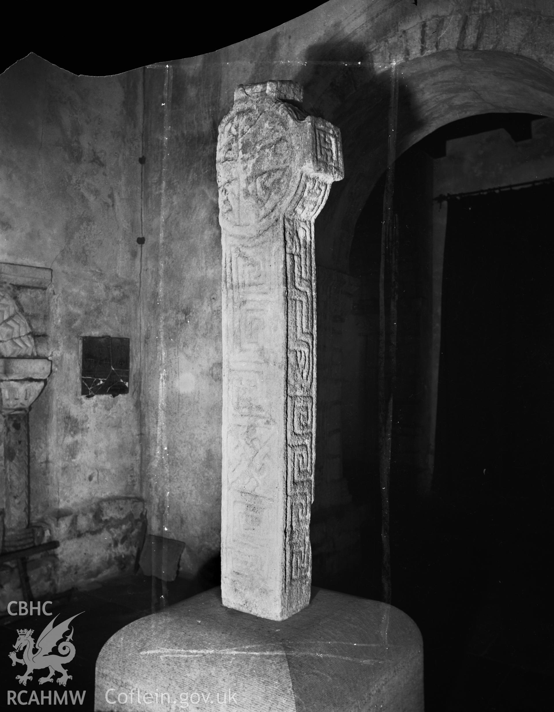 Penmon Cross inside the priory church.