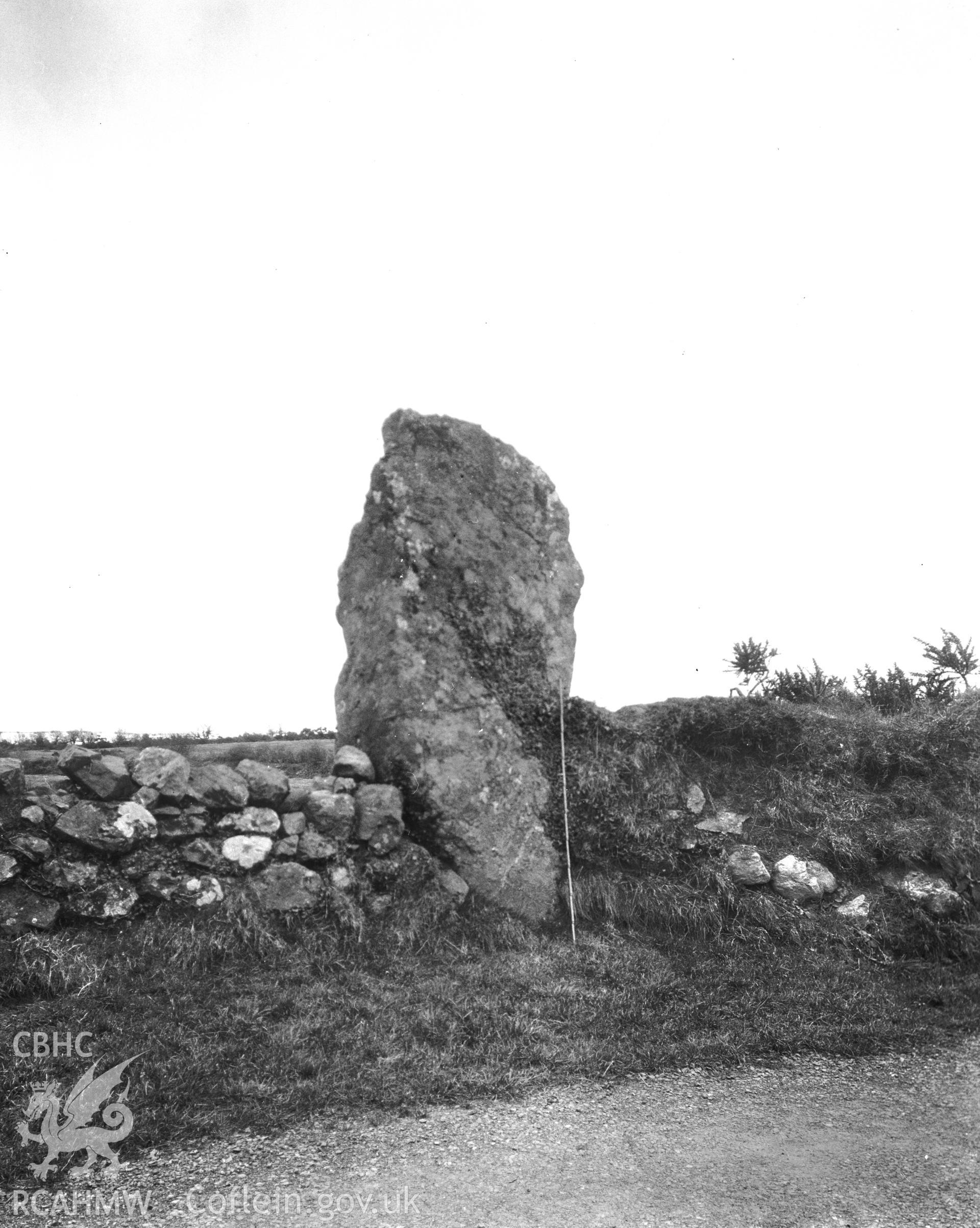 Black and white photograph of Maen Addwyn Standing Stone taken by RCAHMW before 1960.