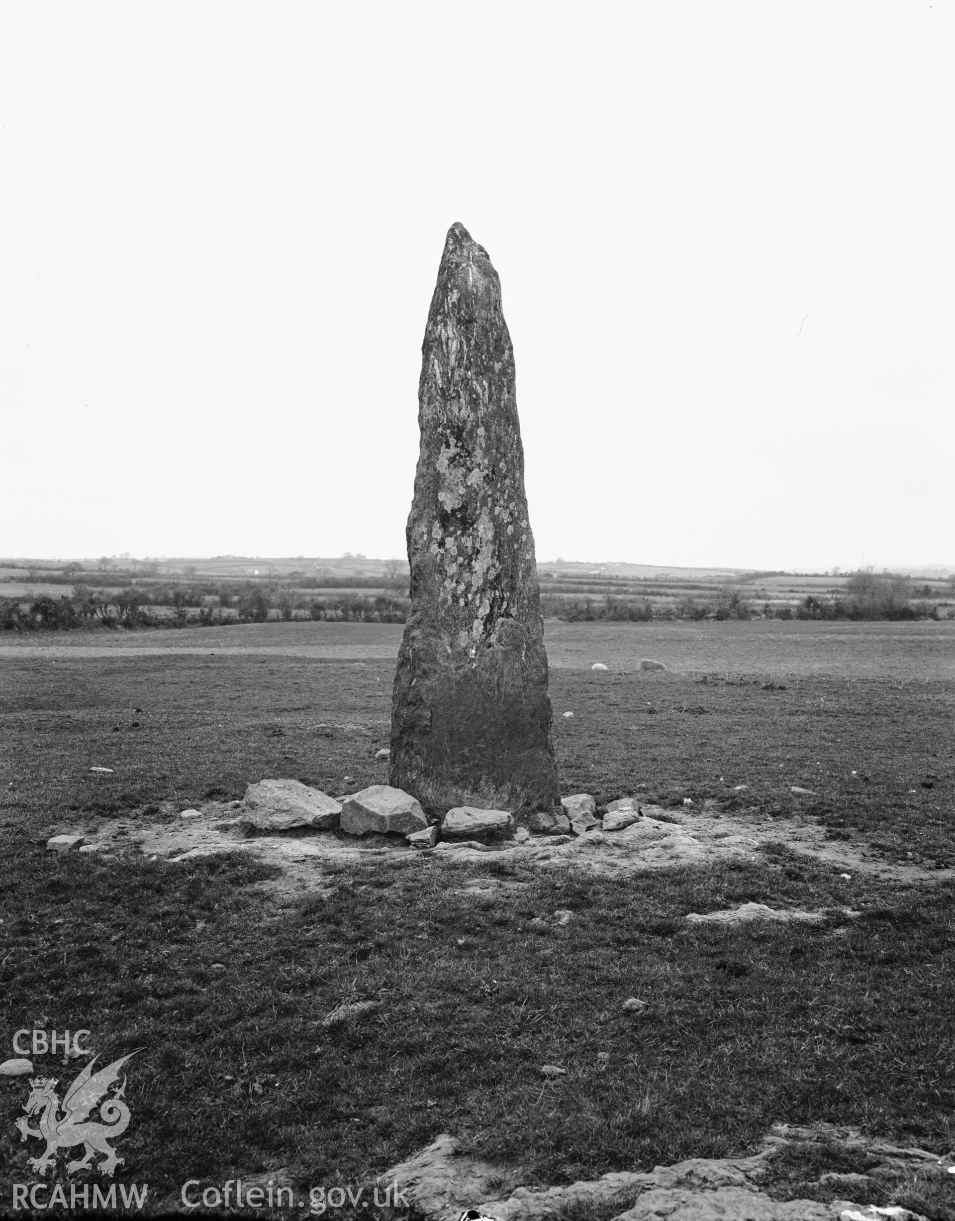 Black and white photograph showing Standing Stone near Bryn Celli Ddu, taken by RCAHMW before 1960.