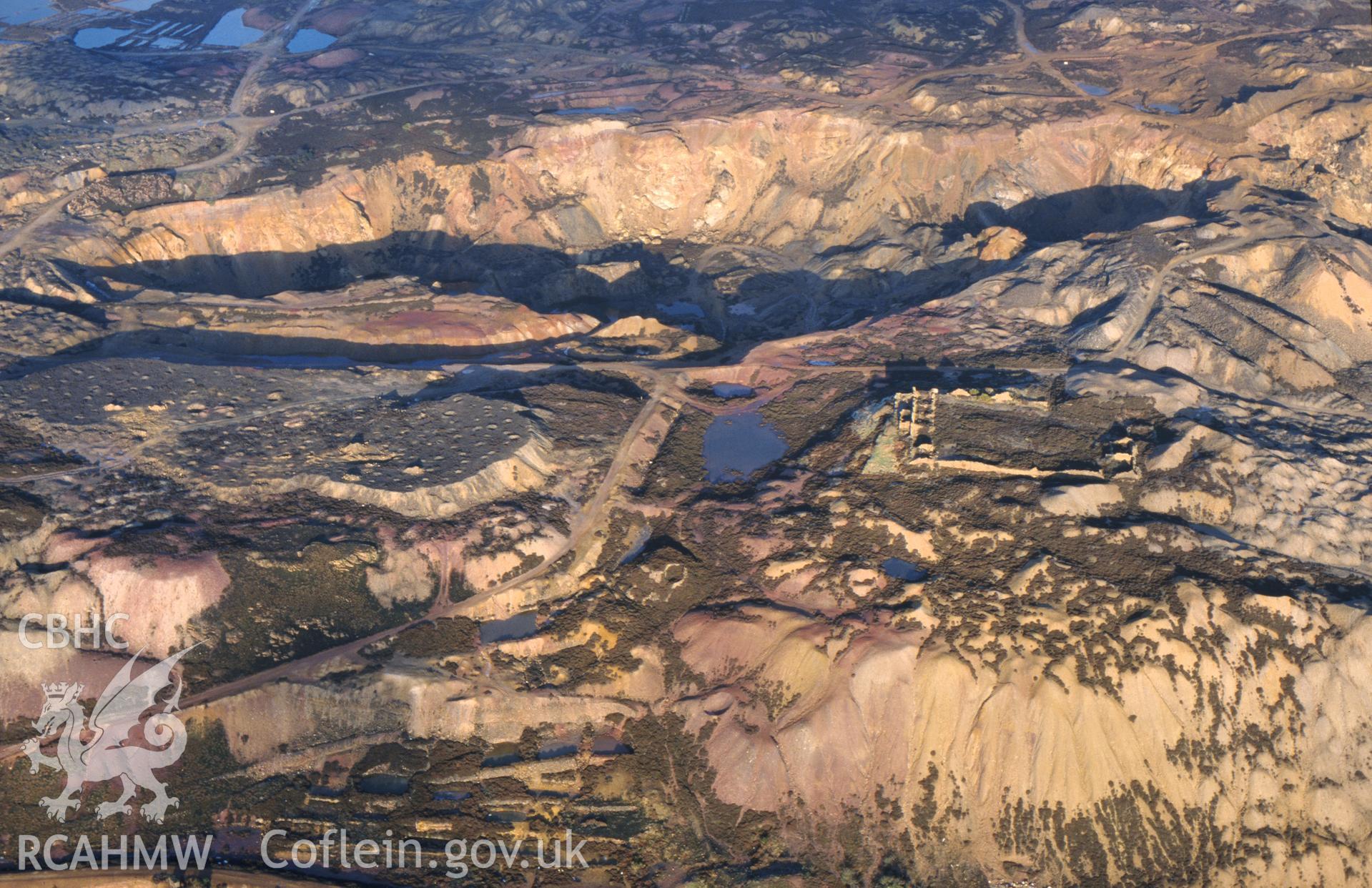 RCAHMW colour slide oblique aerial photograph of Parys Copper Mine, Amlwch, taken on 10/01/1999 by Toby Driver