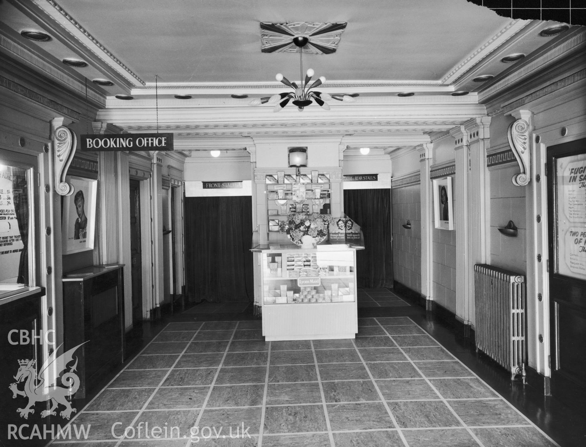 One black and white print of the Prince of Wales Theatre, Cardiff, showing the interior - foyer and booking office. Undated but received by NBR on 22/03/1960.