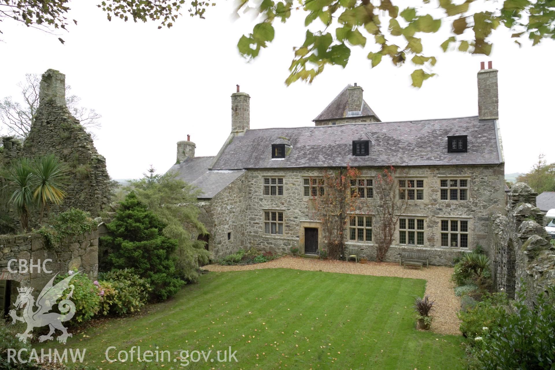 Exterior from the east, including part of ruined earlier house.