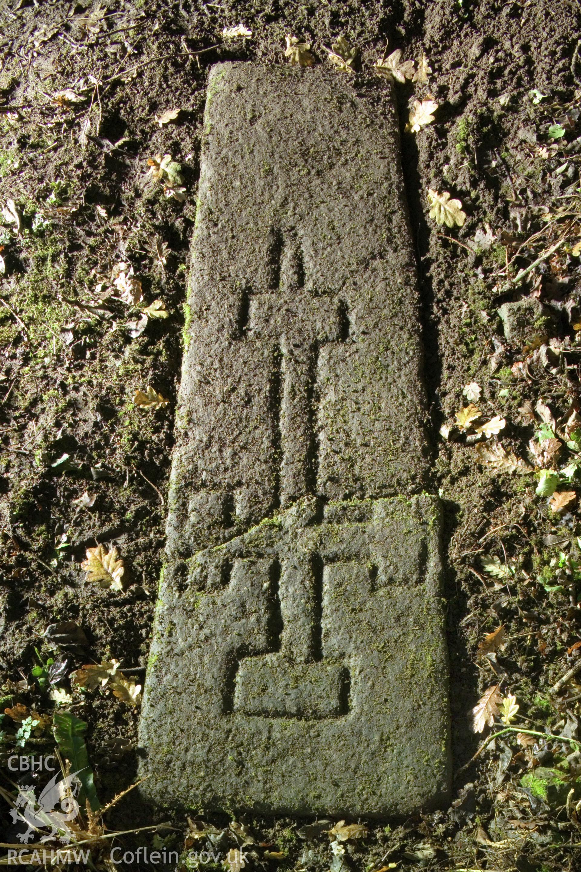 Cross-carved stone.