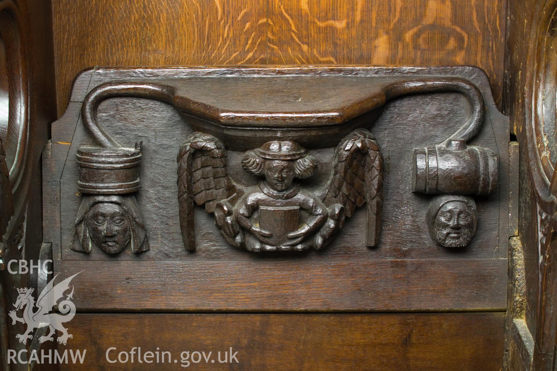 Misericord on North wall.