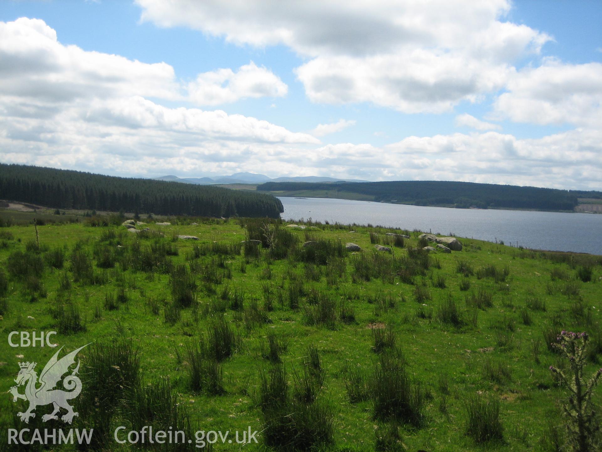 Waen Ddafad cairn from the north east with Llyn Brenig in the background.