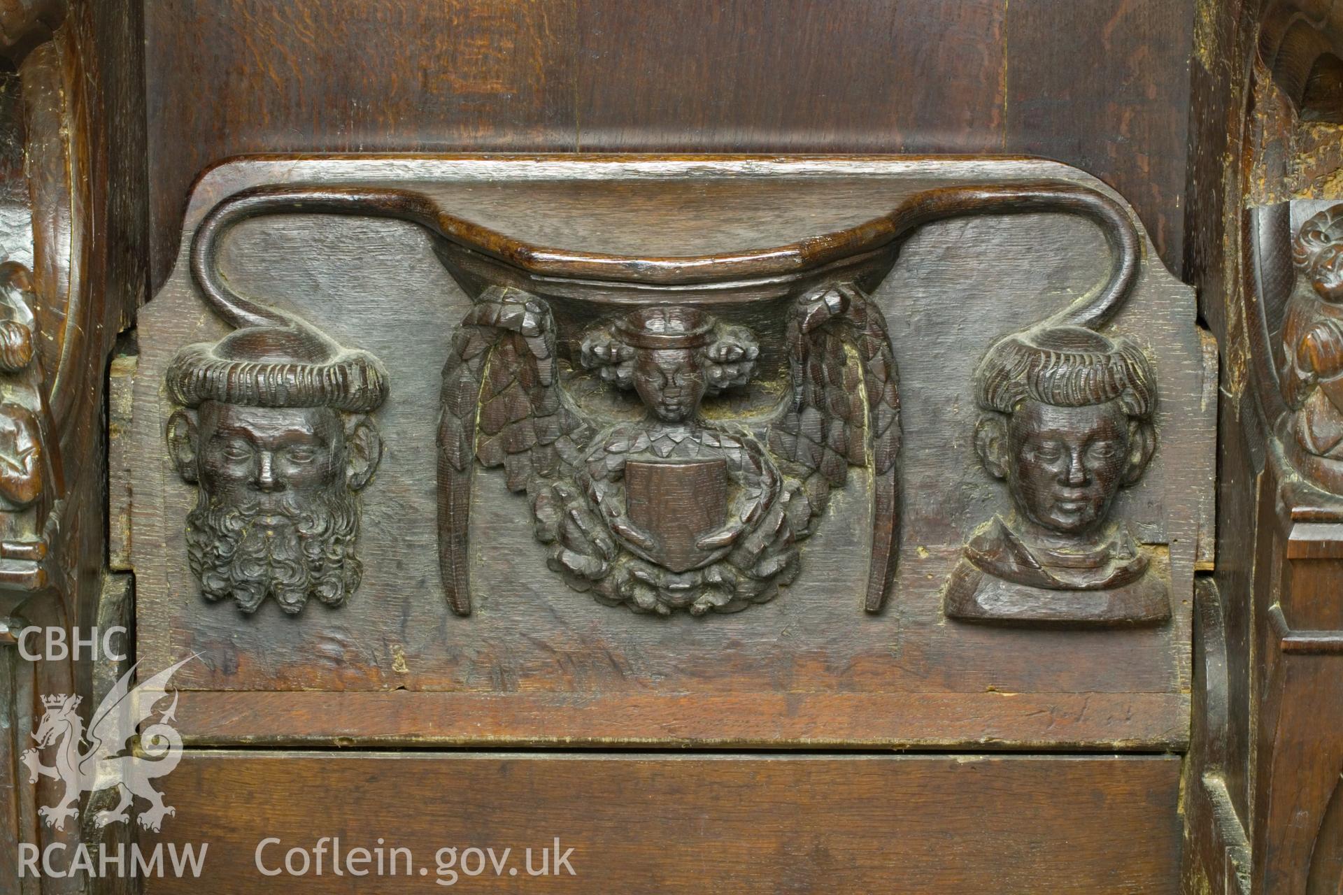 Misericord on south wall.