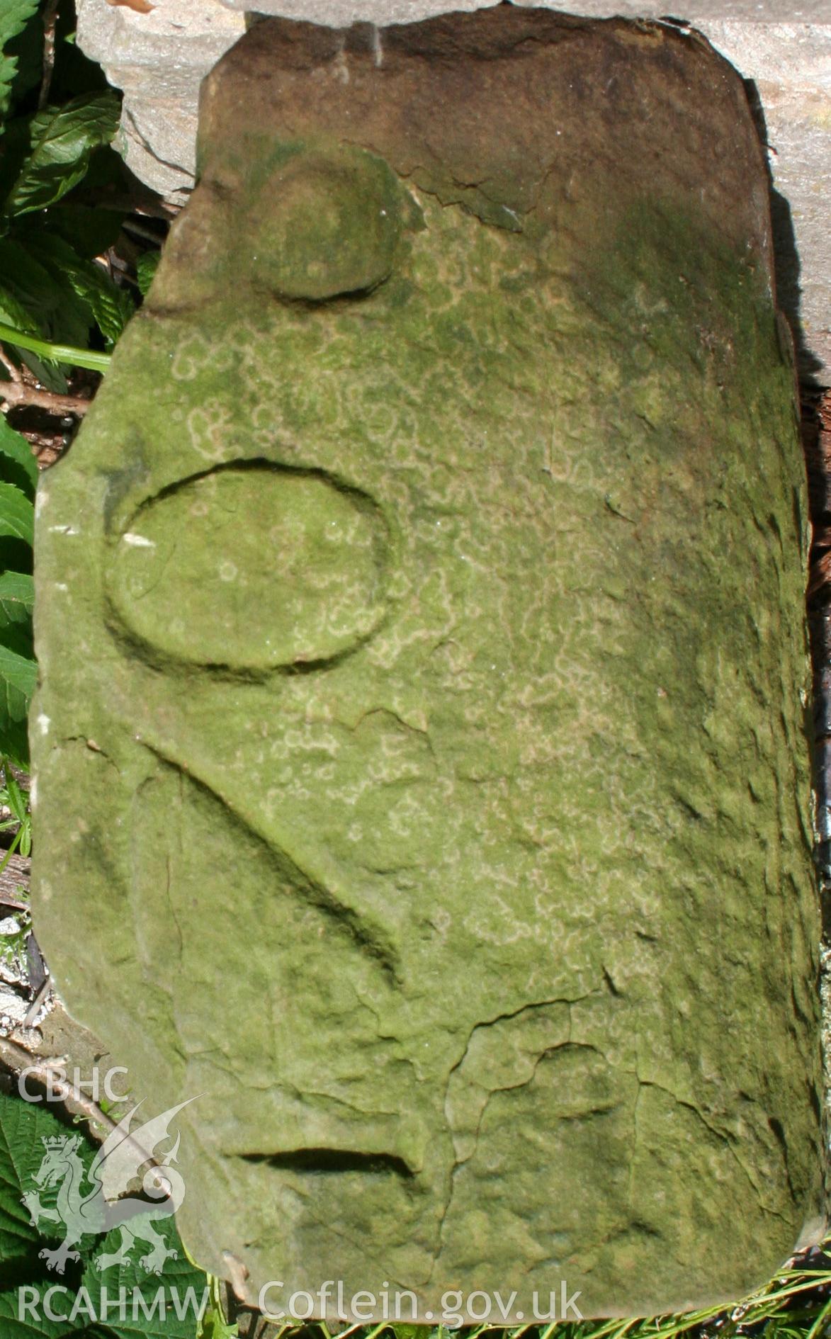 Datestone on fallen coping stone