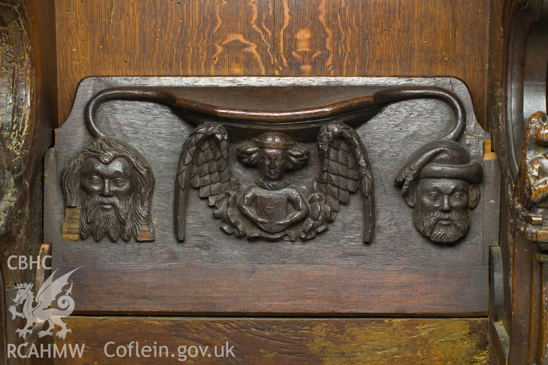 Misericord on North wall.