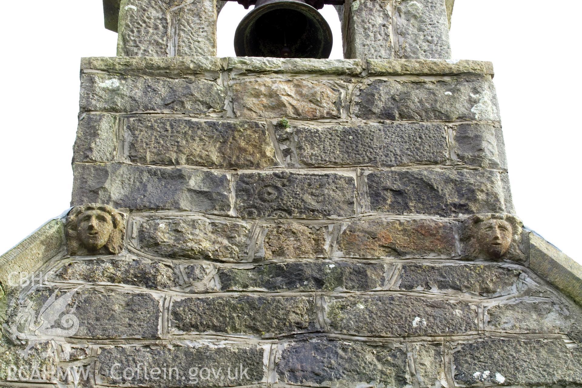 Carved stone on belfrey.