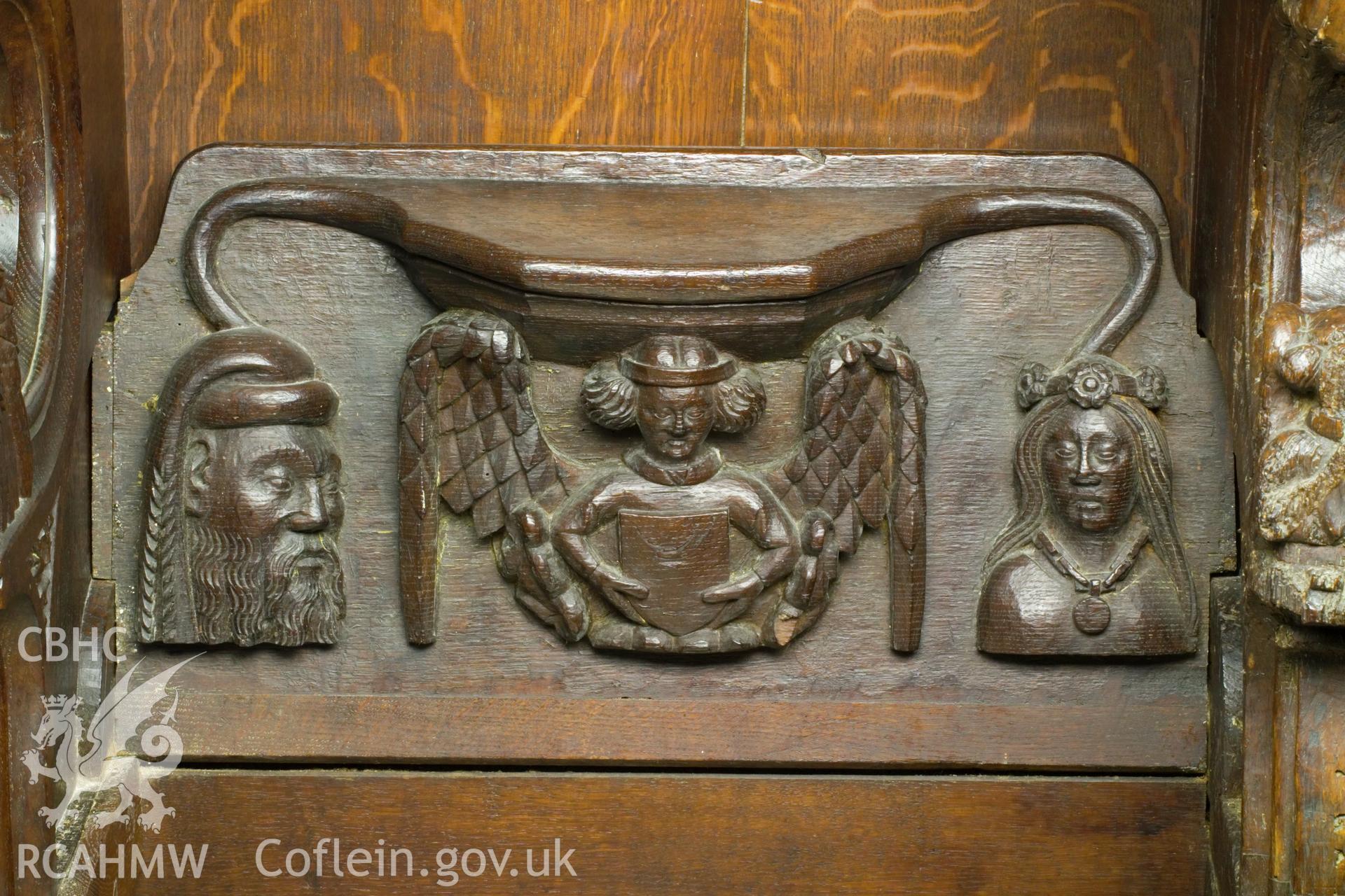 Misericord on south wall.