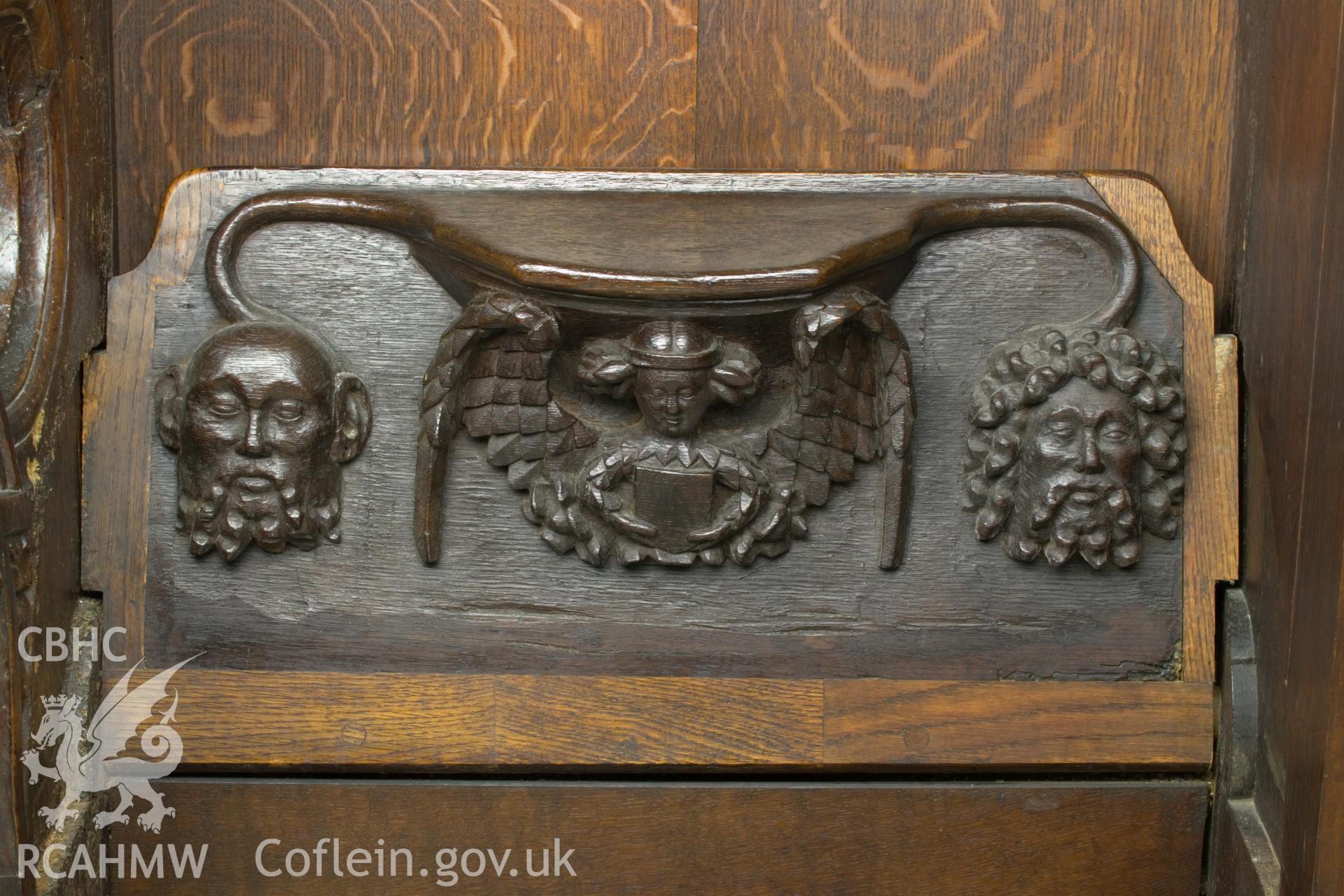 Misericord on North wall.