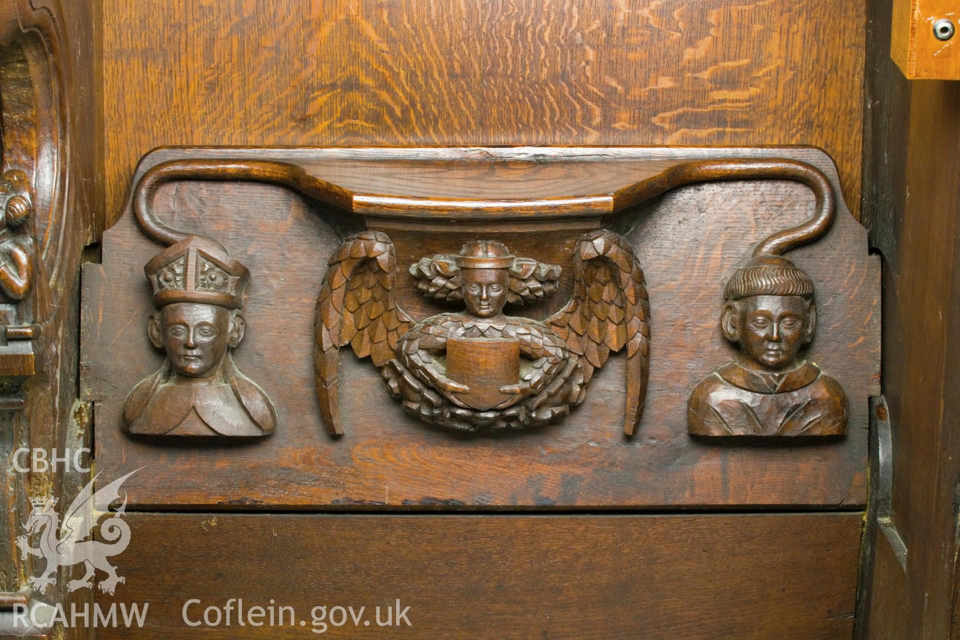 Misericord on west screen.