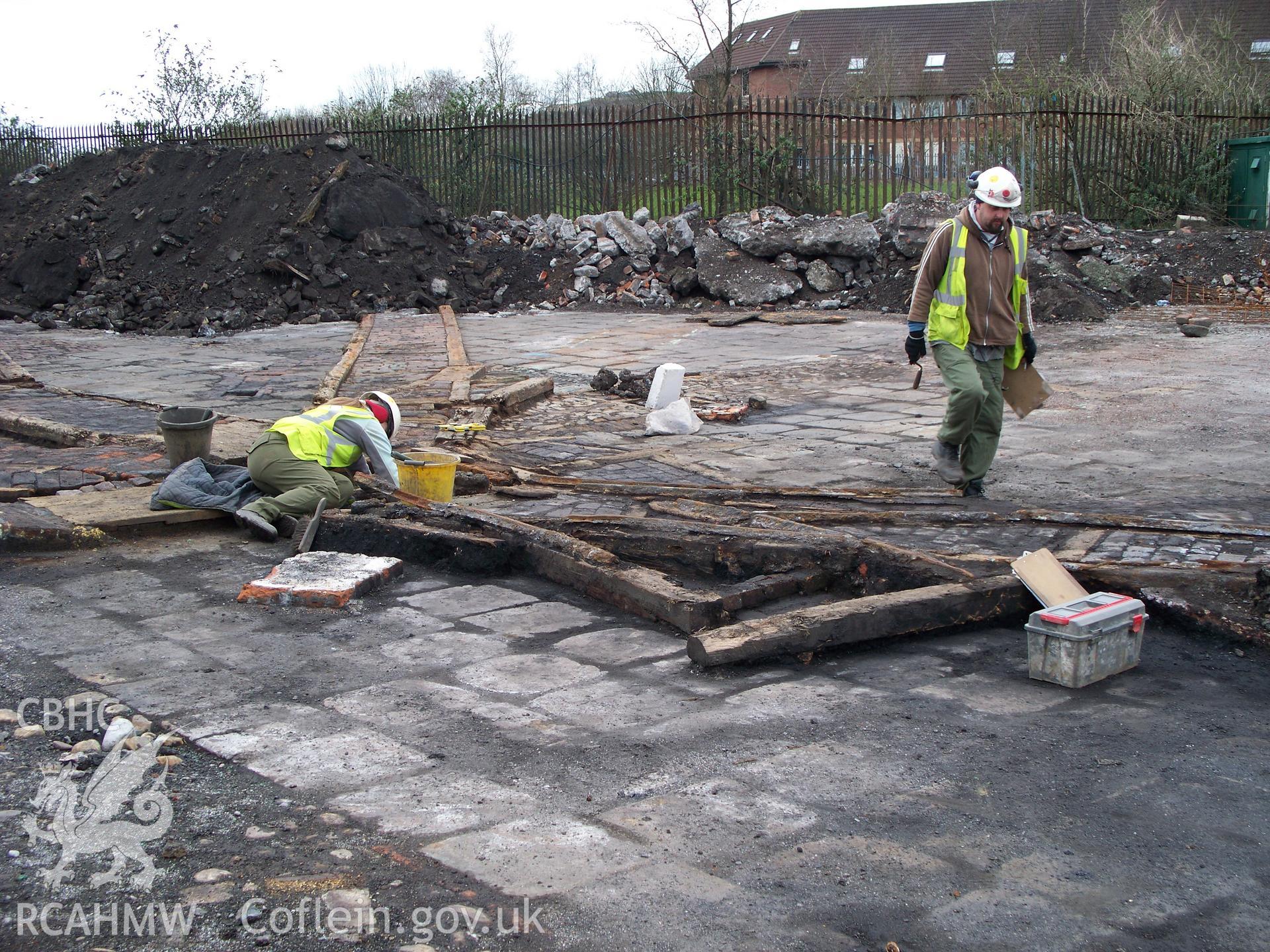 Large cast copper-slag blocks on the former copperworks river-wharves with fan of railway tracks looking SW.