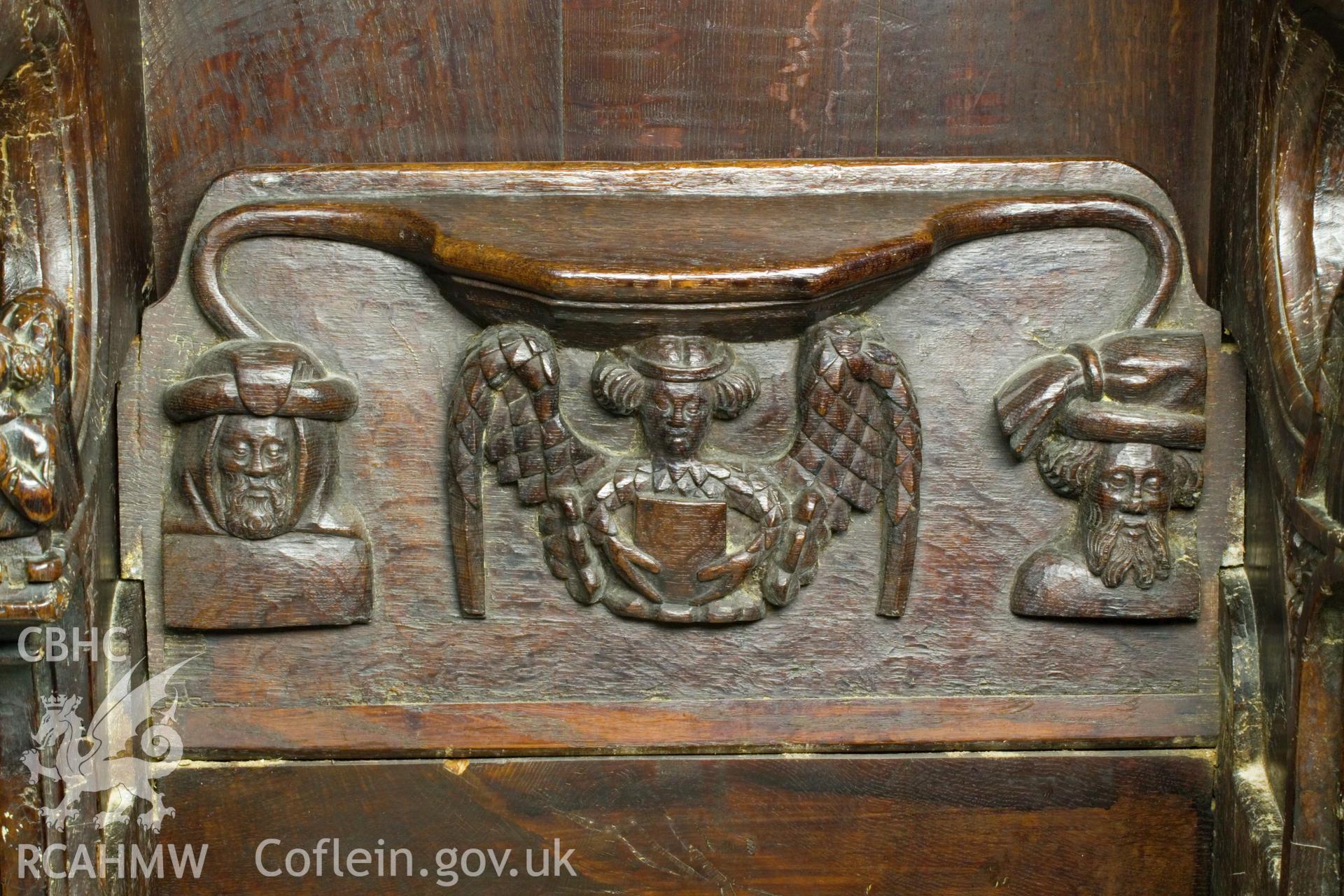 Misericord on south wall.