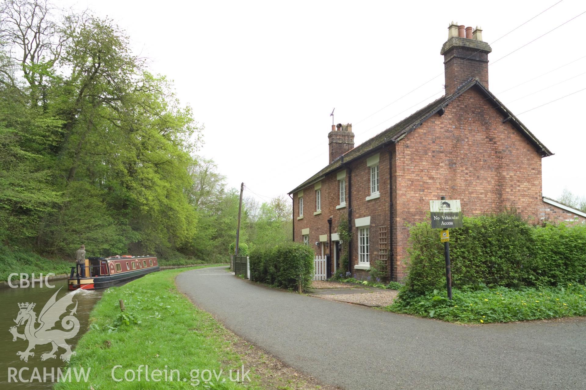 Cottages with boat from east.